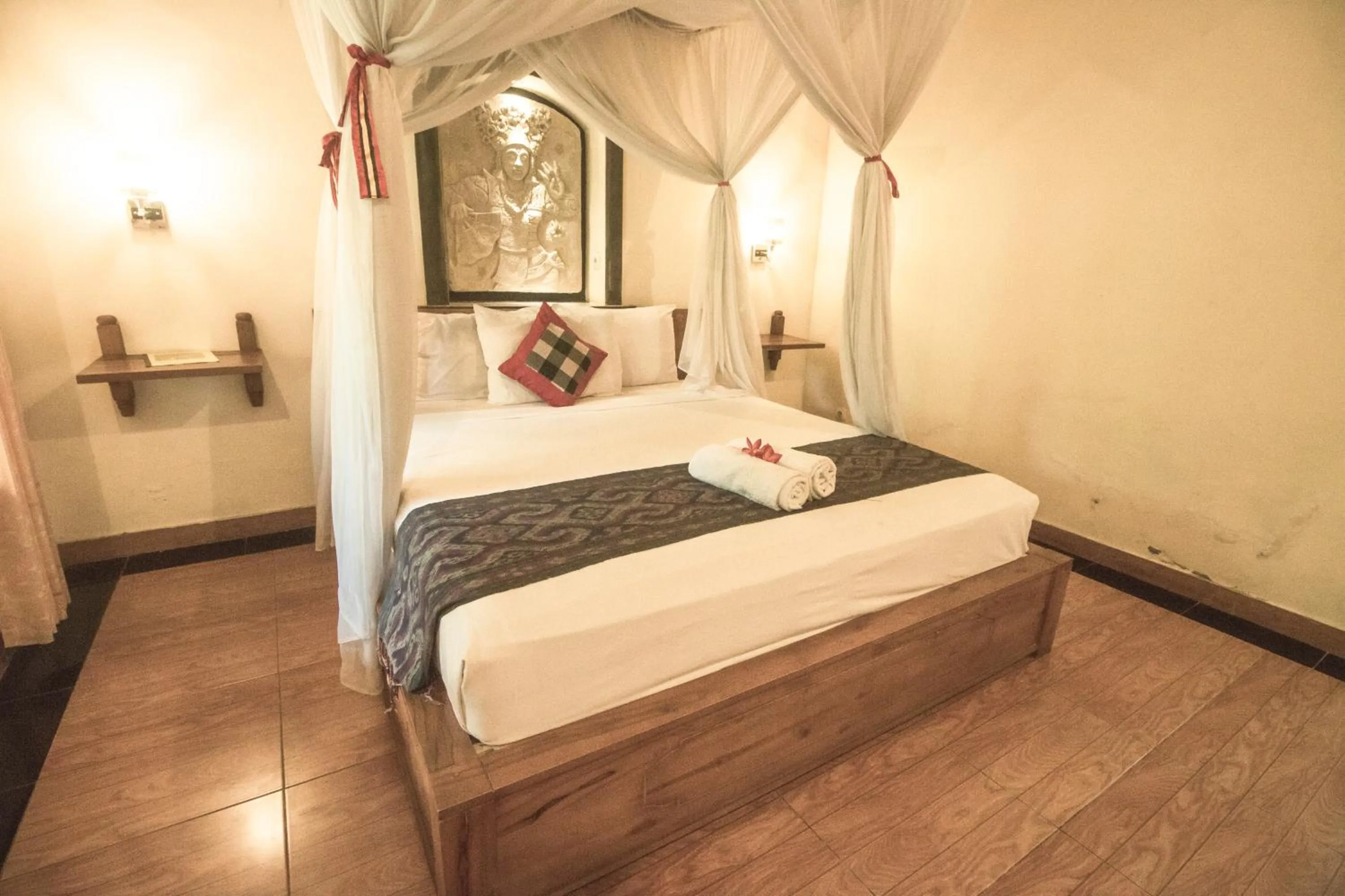 Bed in Trijaya Guest House Pemuteran