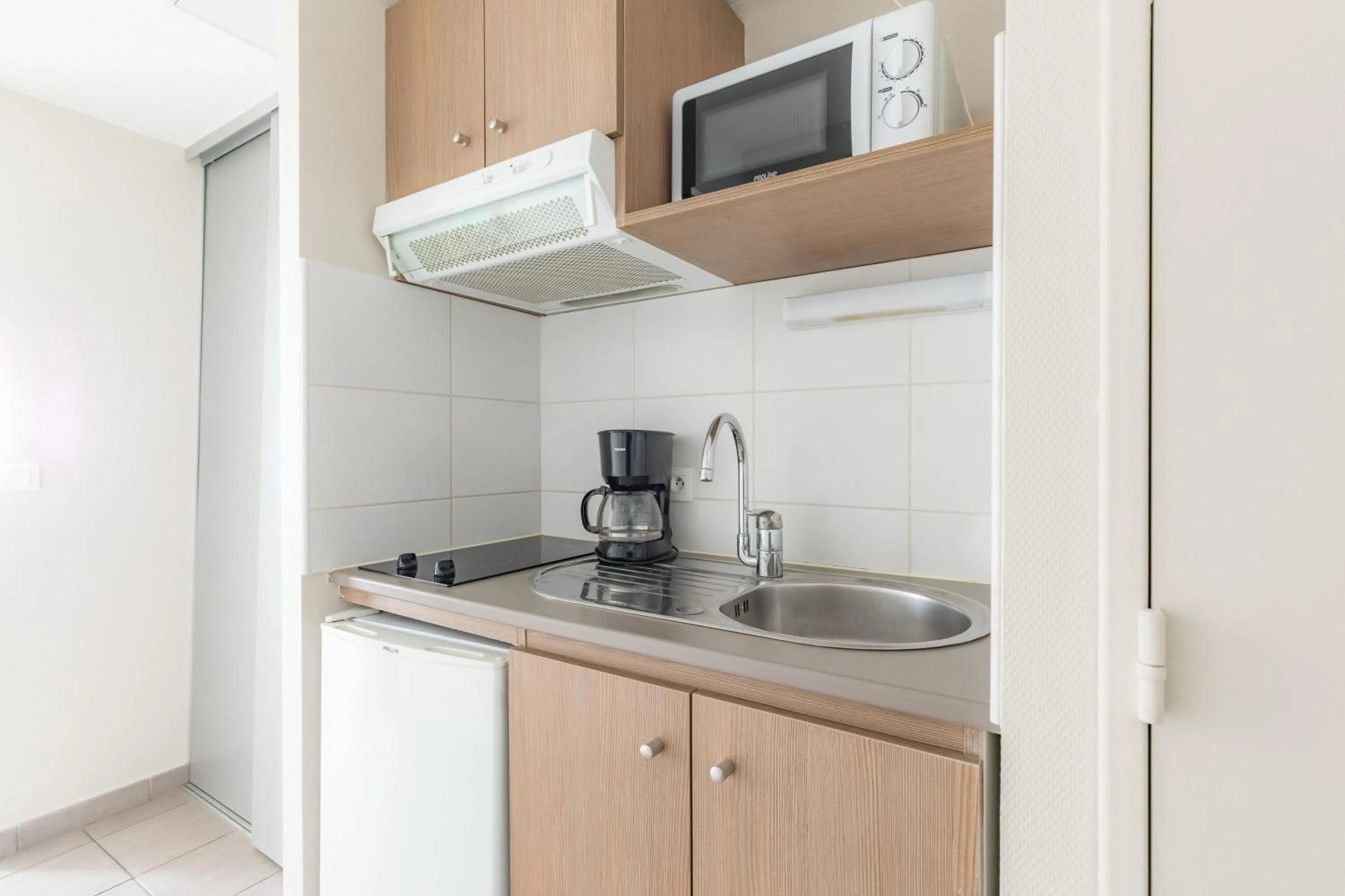 Kitchen or kitchenette in Appart'City Classic Valence