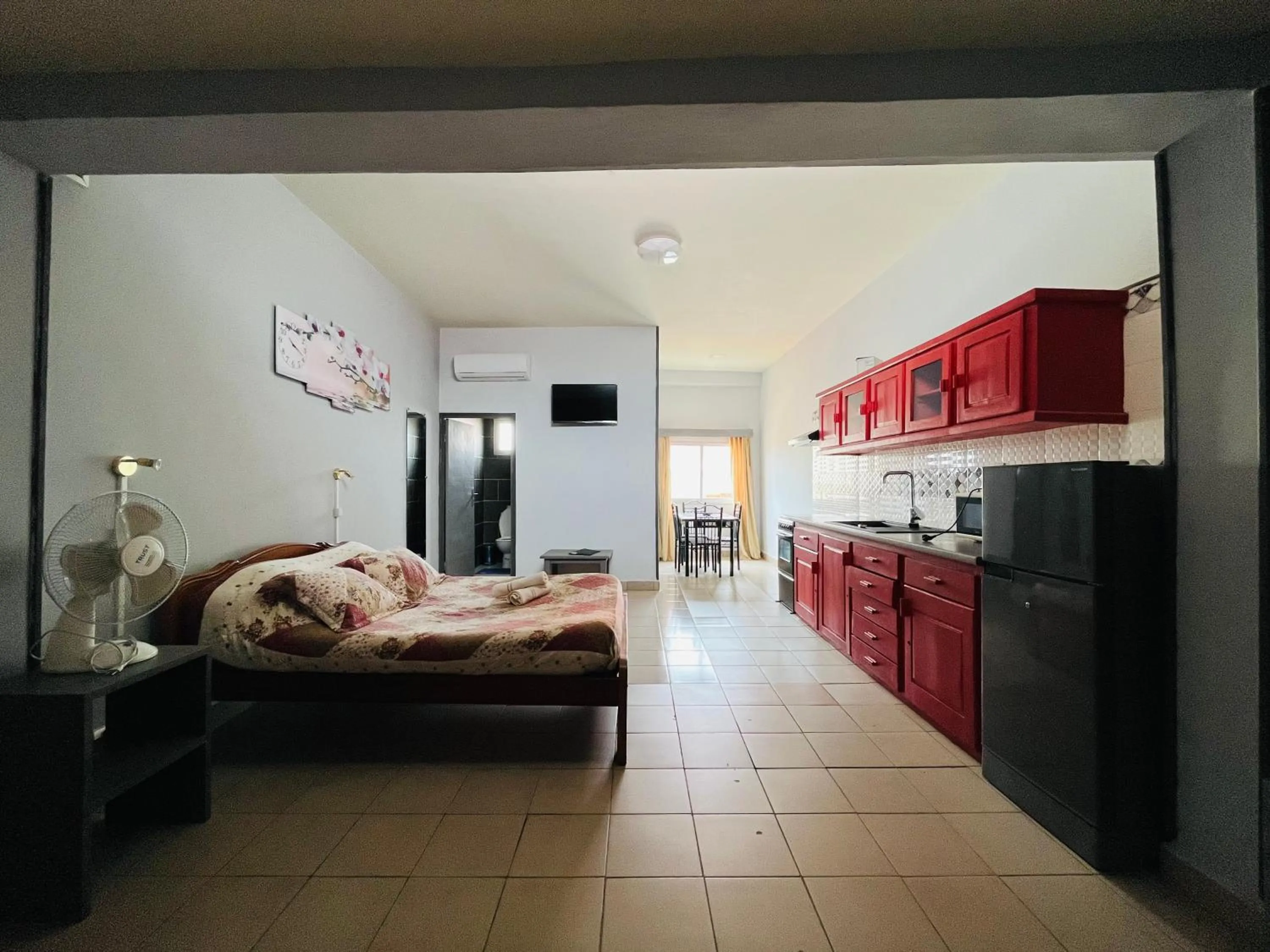 Photo of the whole room, Bed in Hôtel - Appartement meublé " LES FLOTS BLEU "