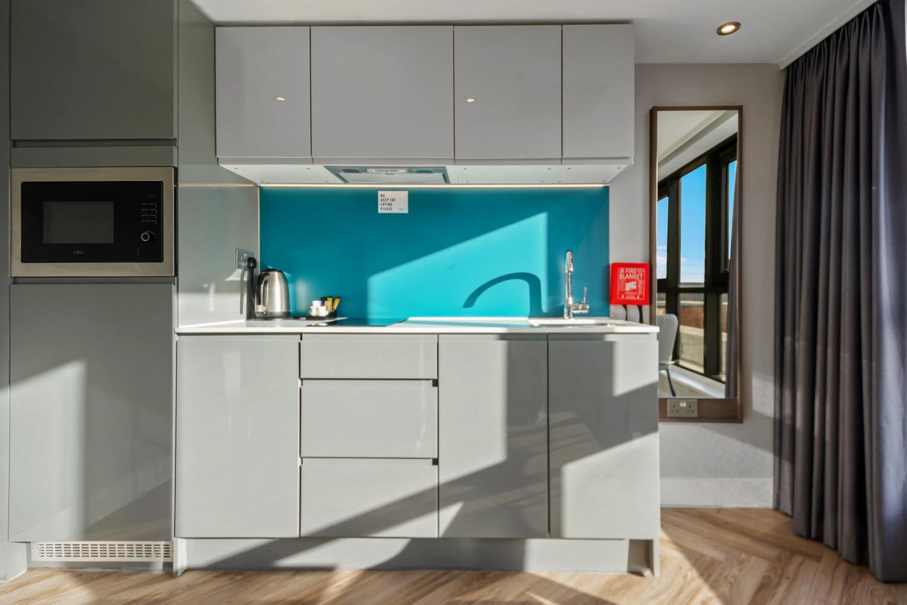 Kitchen or kitchenette in Roomzzz Newcastle City