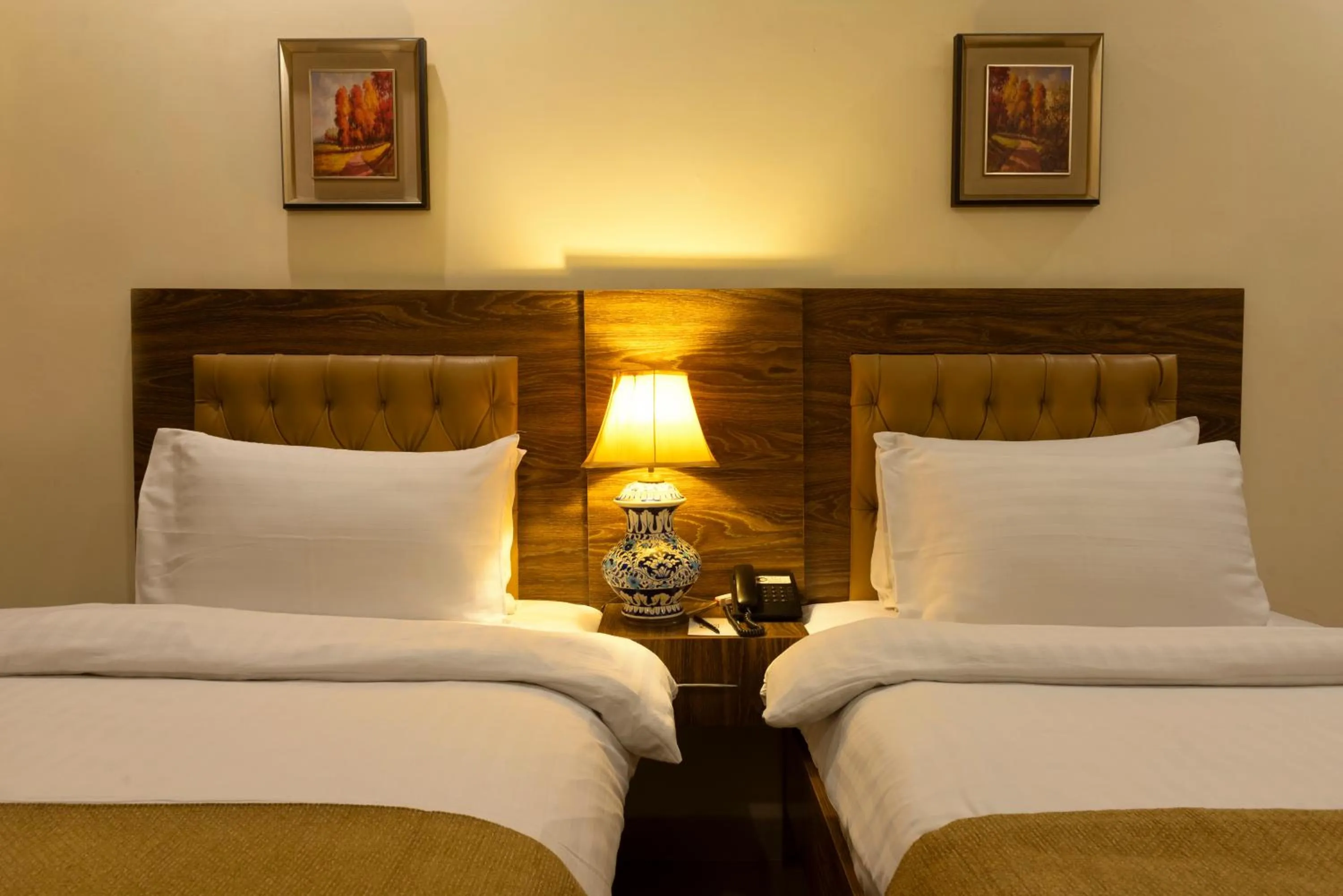 Bed in Hotel One Lalazar Multan