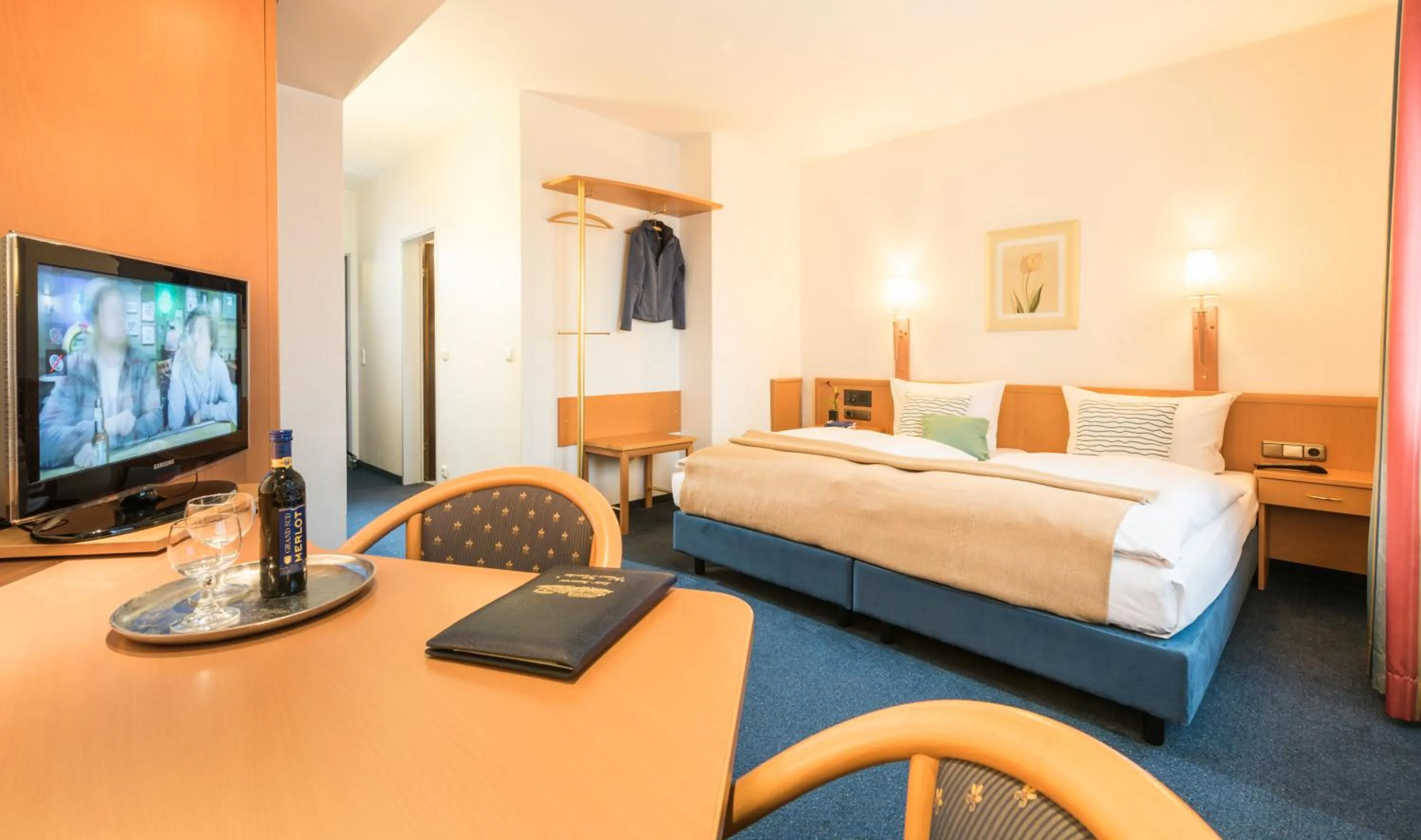 TV and multimedia, Bed in Hotel Monika