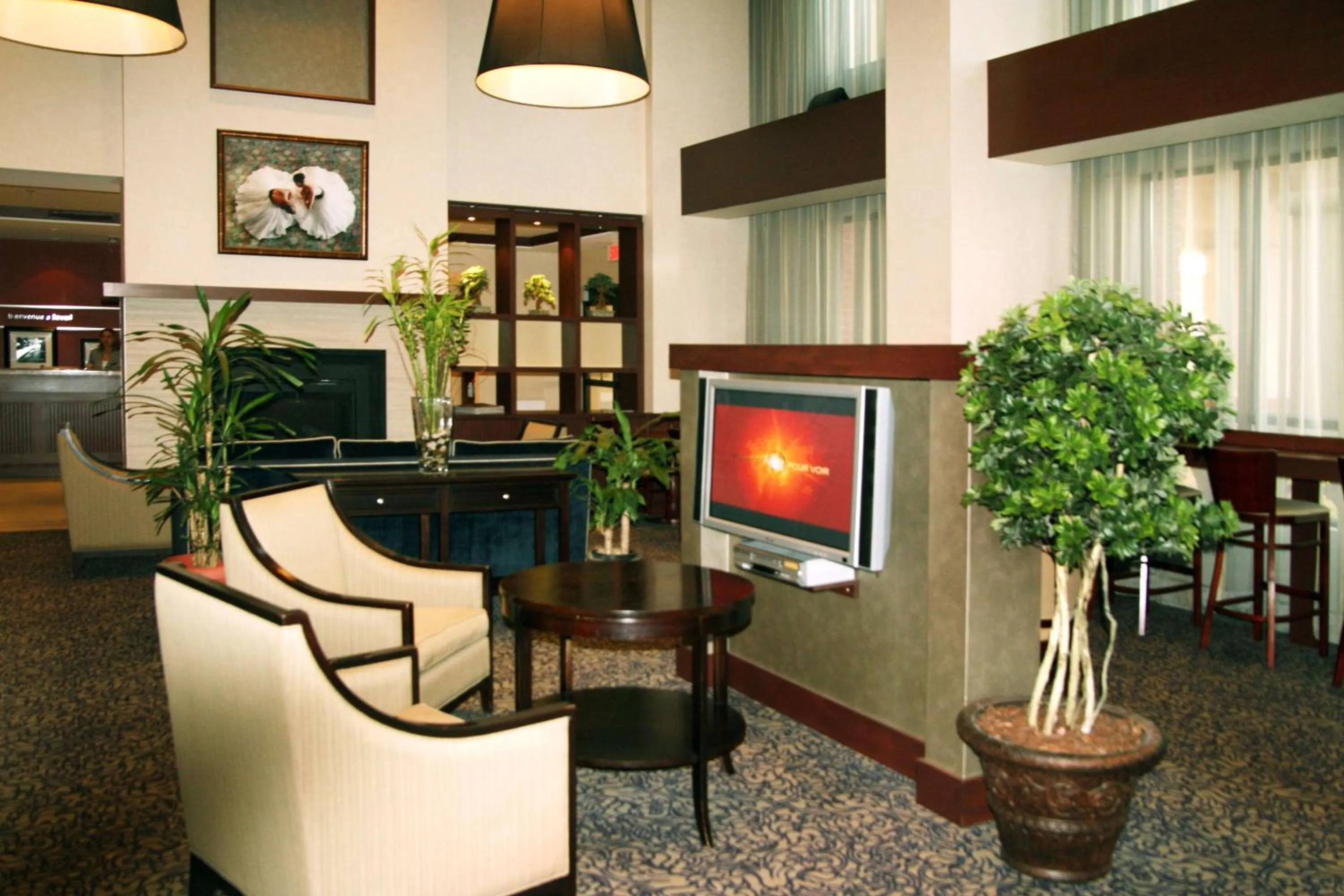 Lobby or reception in Hampton Inn & Suites Laval