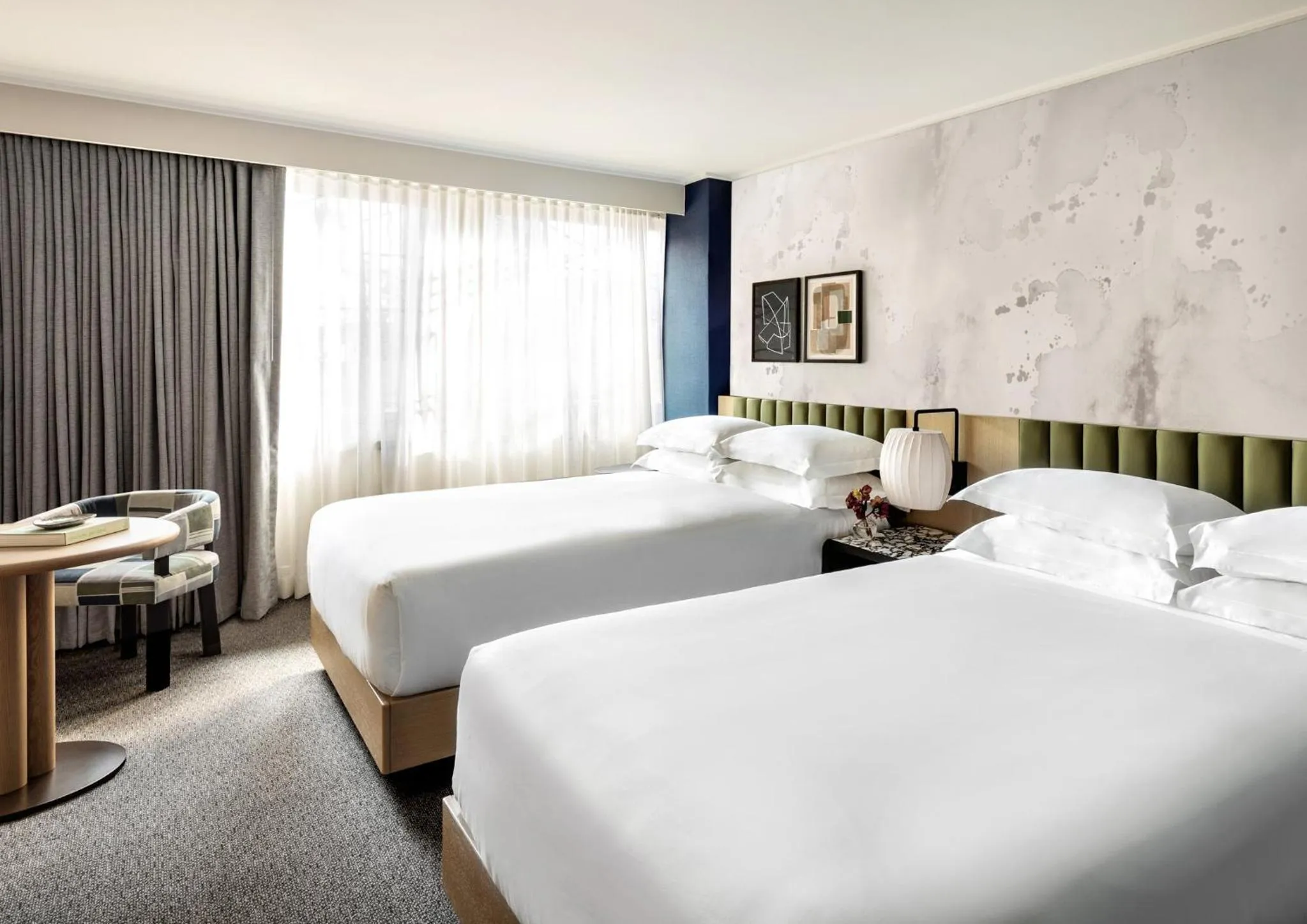 Photo of the whole room, Bed in Kimpton Theta New York - Times Square by IHG