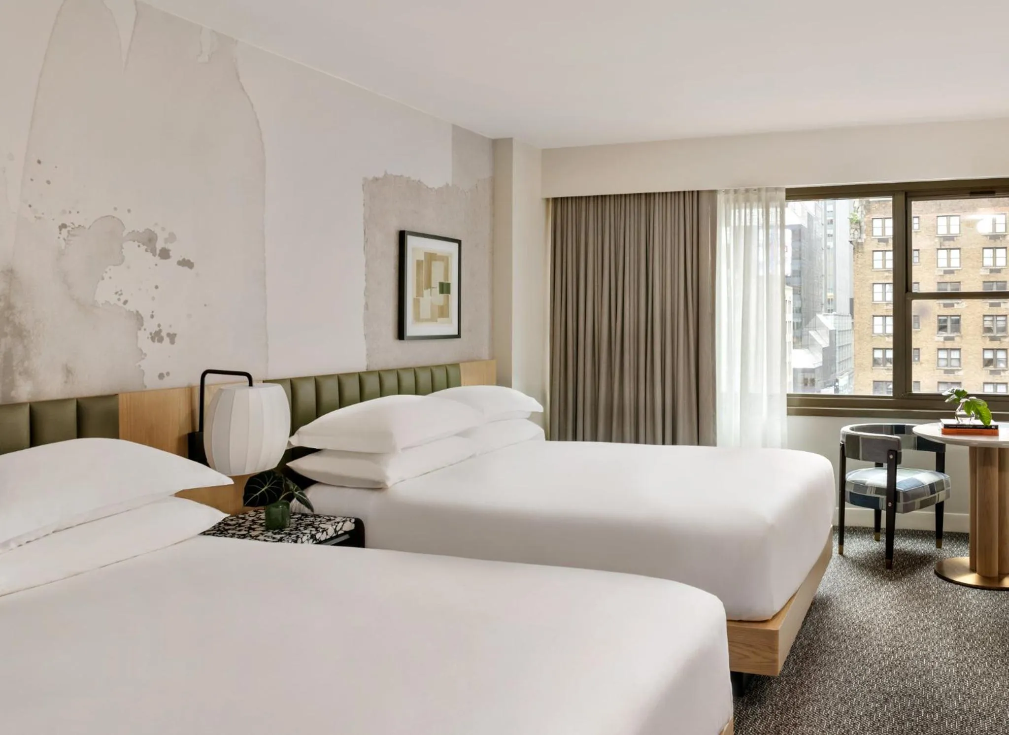 Photo of the whole room, Bed in Kimpton Theta New York - Times Square by IHG