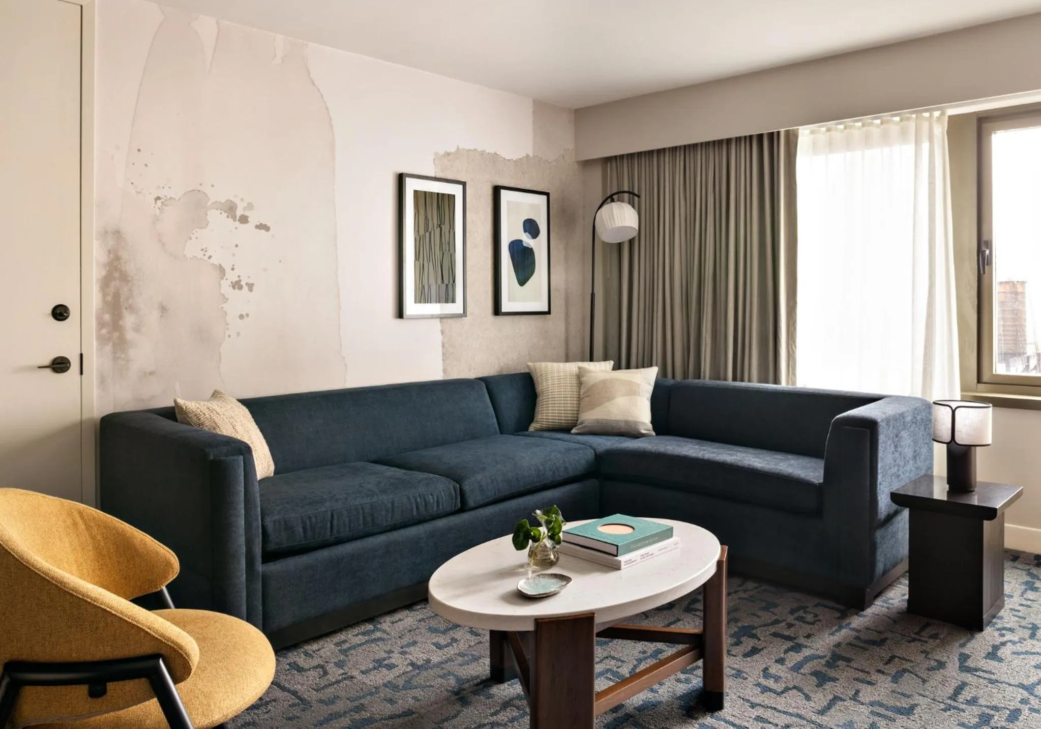 Living room in Kimpton Theta New York - Times Square by IHG