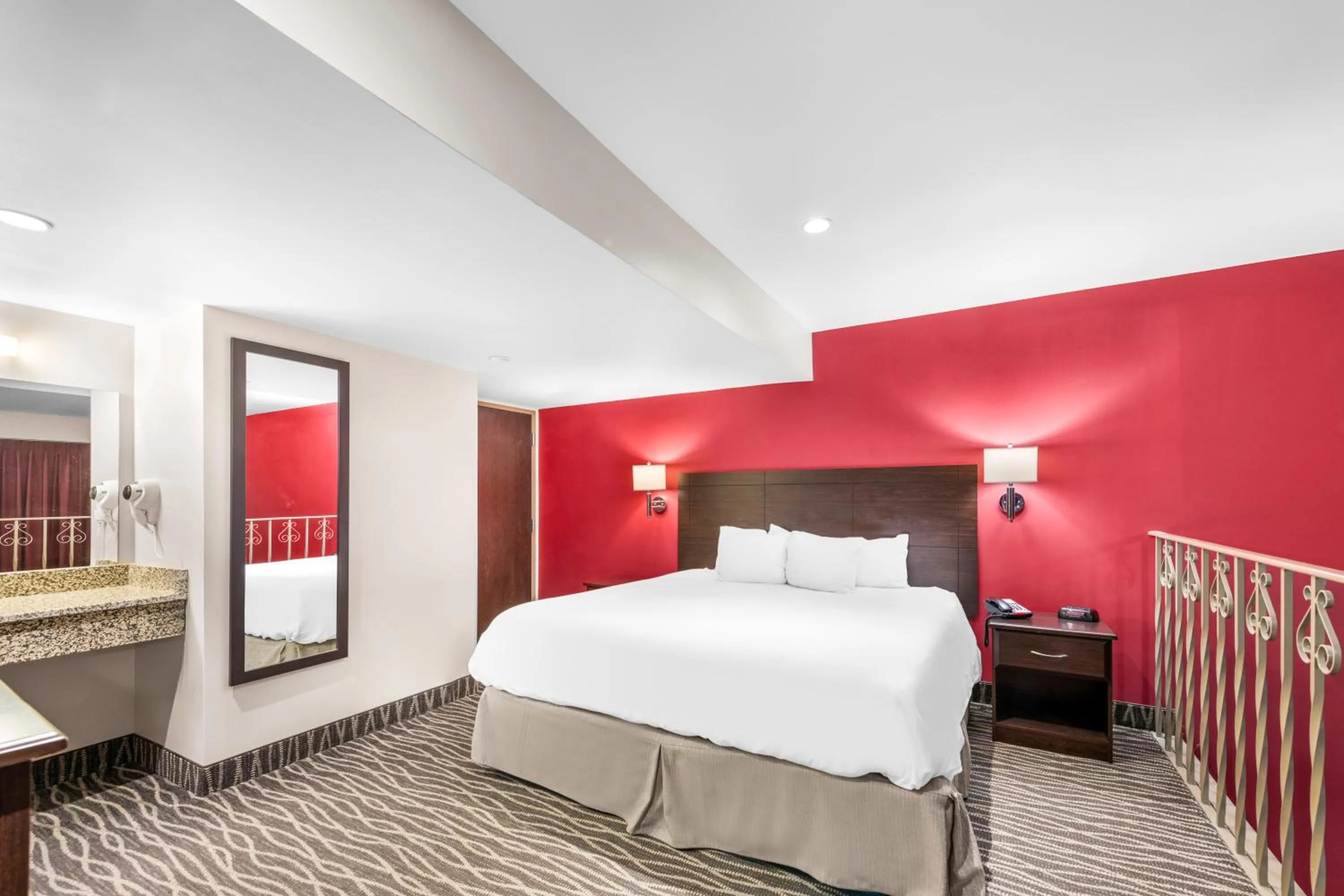 Bed in Ramada by Wyndham Columbus Hotel & Conference Center