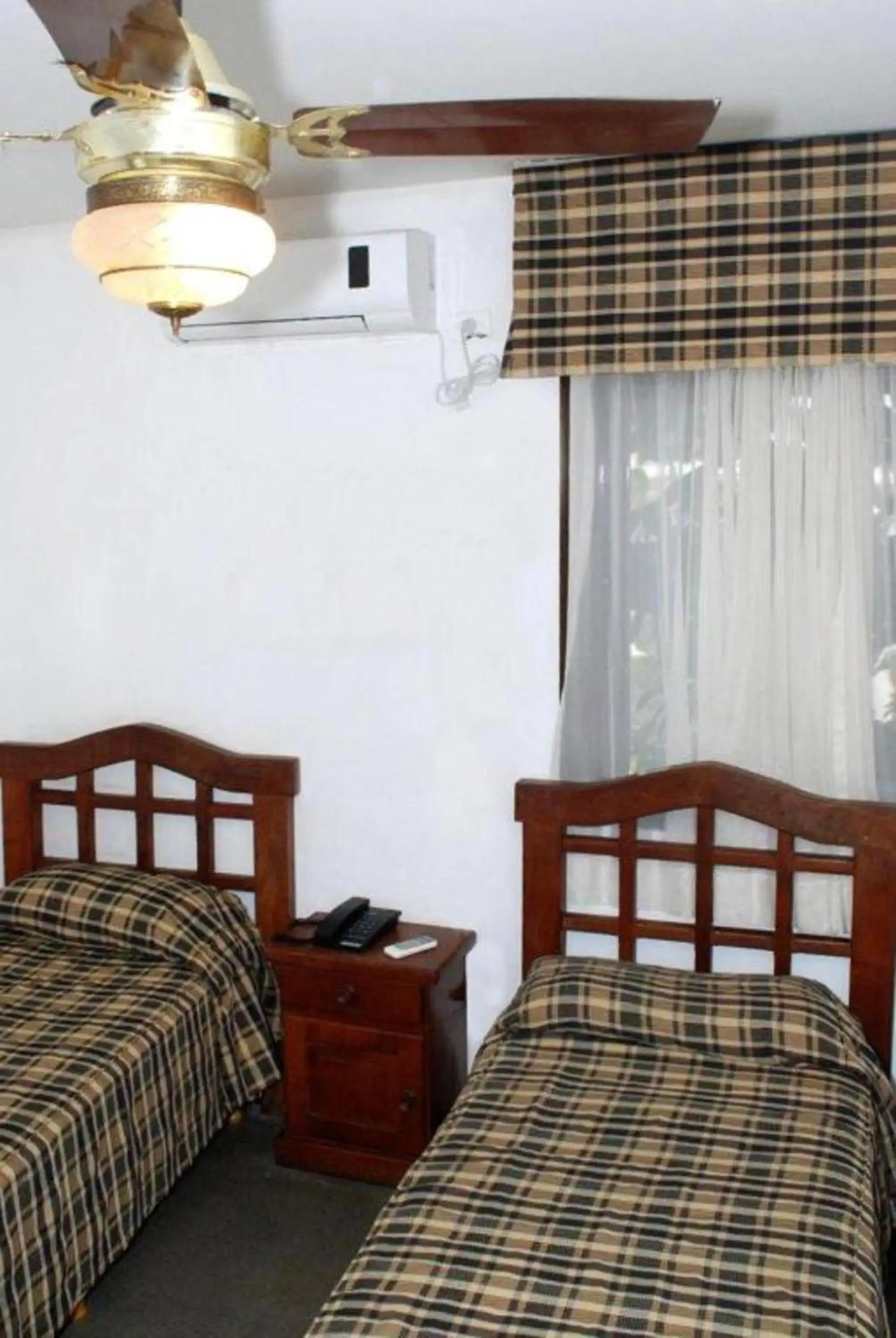 Triple Room in Laerte Hotel Mendoza Triple Room in Laerte Hotel Mendoza