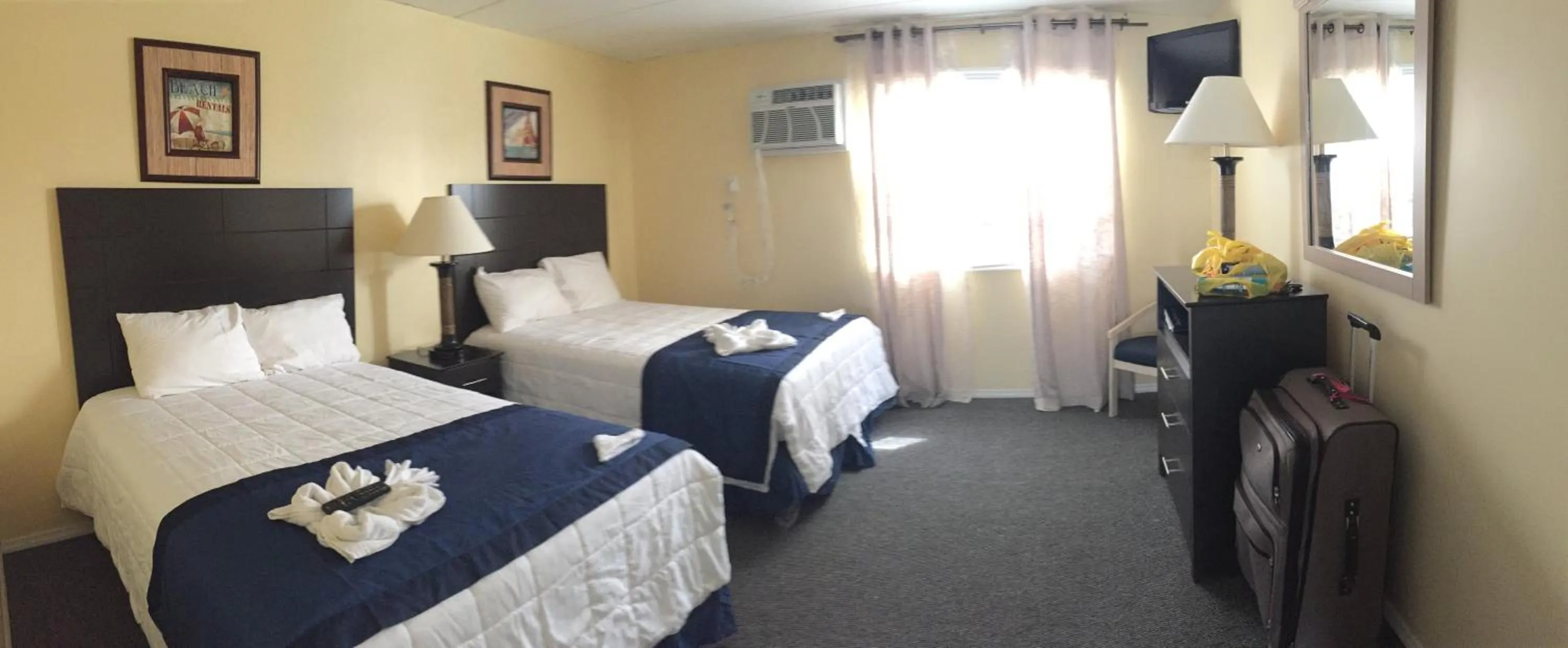 Photo of the whole room, Bed in Sandy Shores Resort