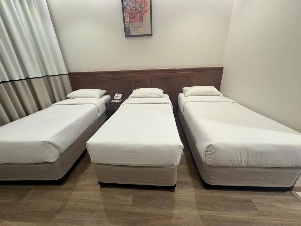 Bed in Rotana Al Mesk Hotel