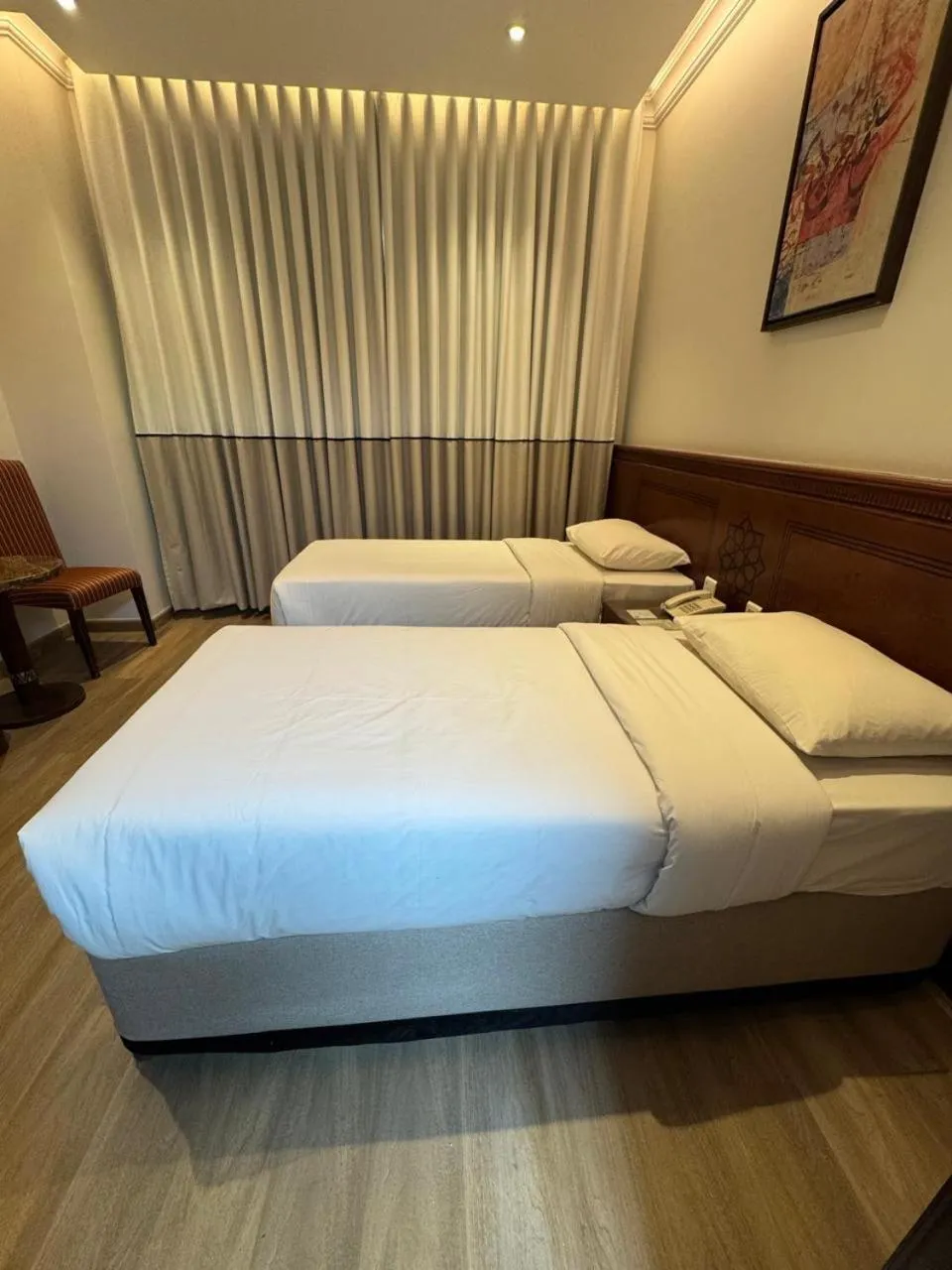 Bed in Rotana Al Mesk Hotel