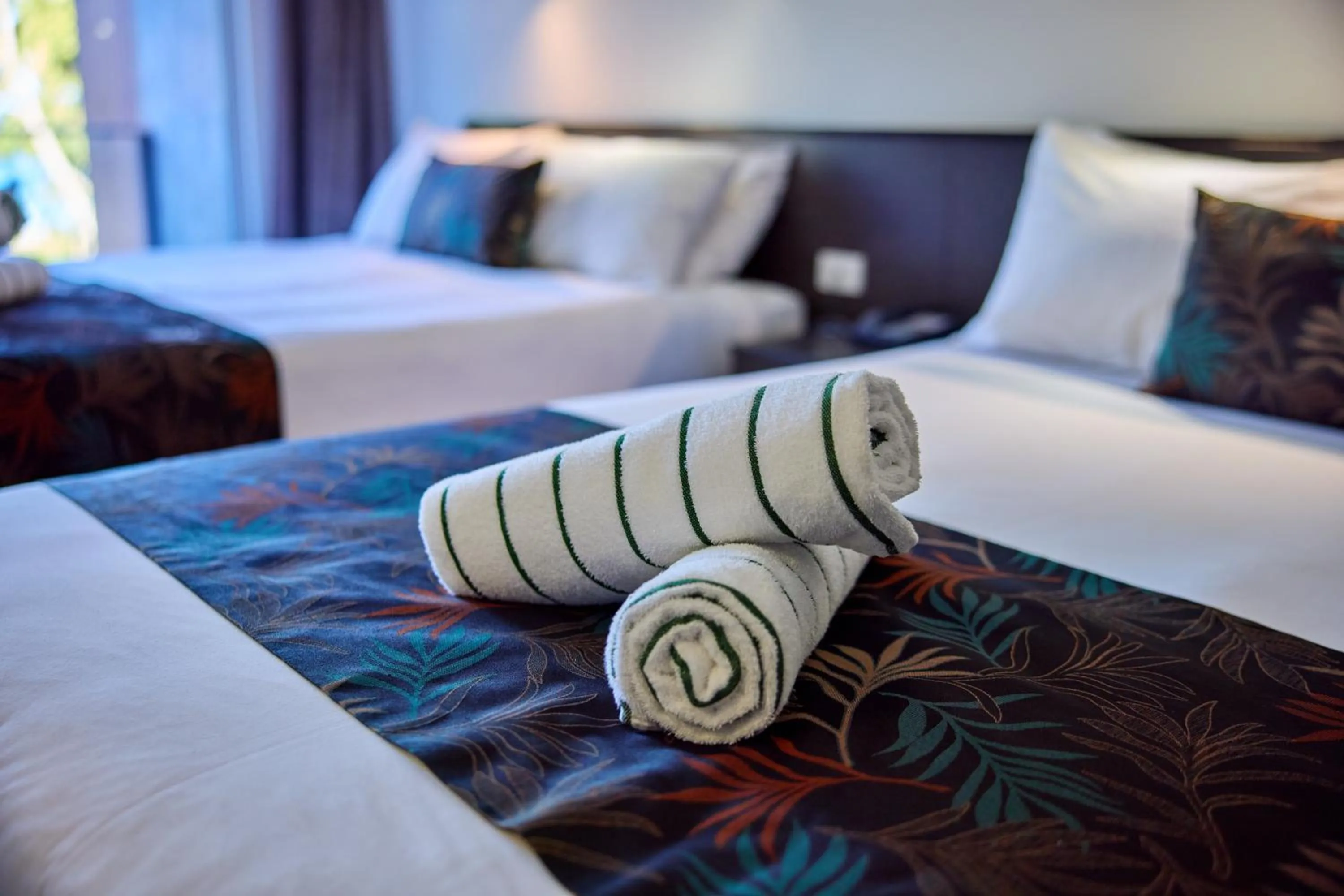 Bed in Castaways Resort & Spa On Mission Beach