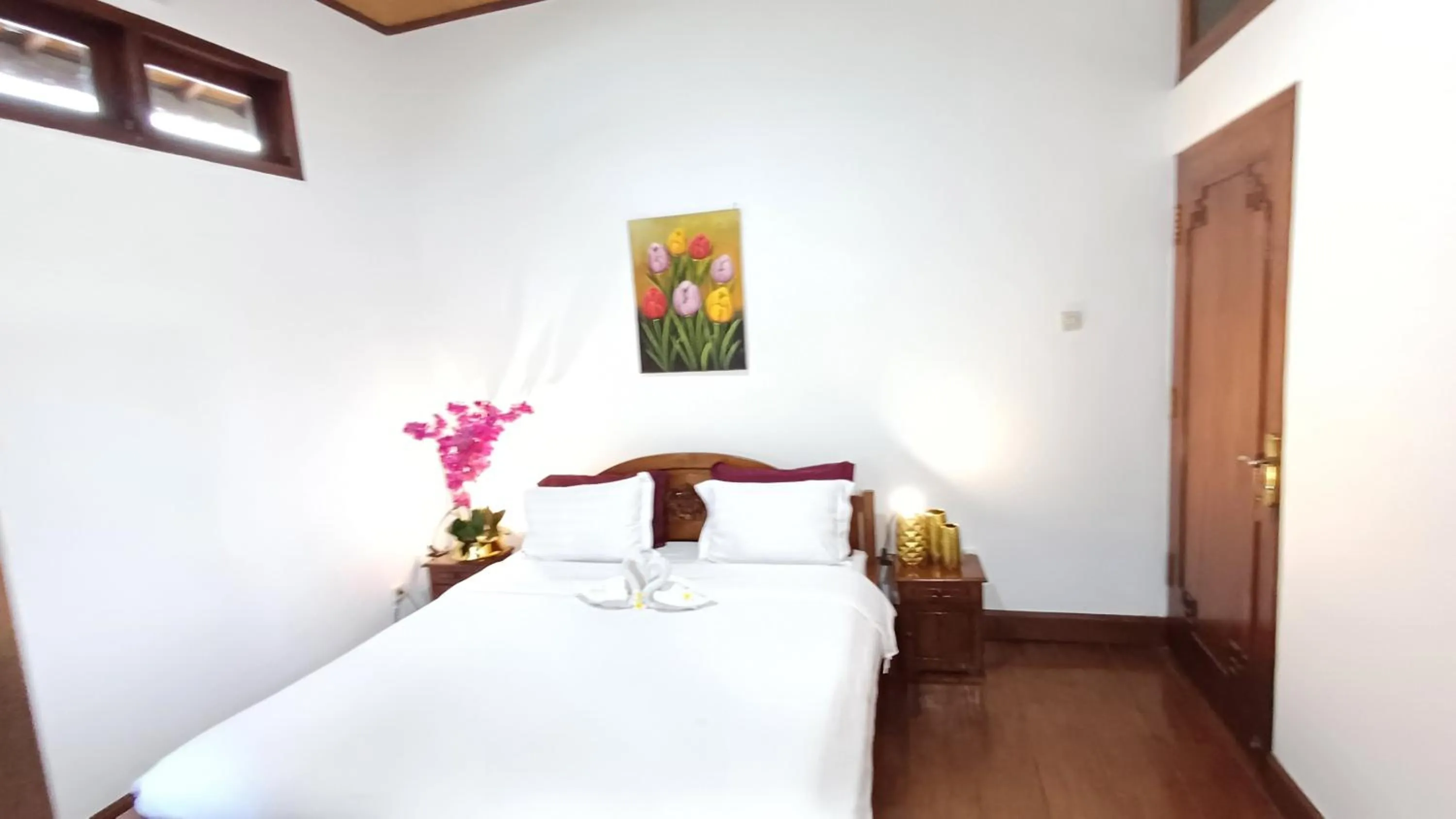 Bed in Balinda Rooms & Villa
