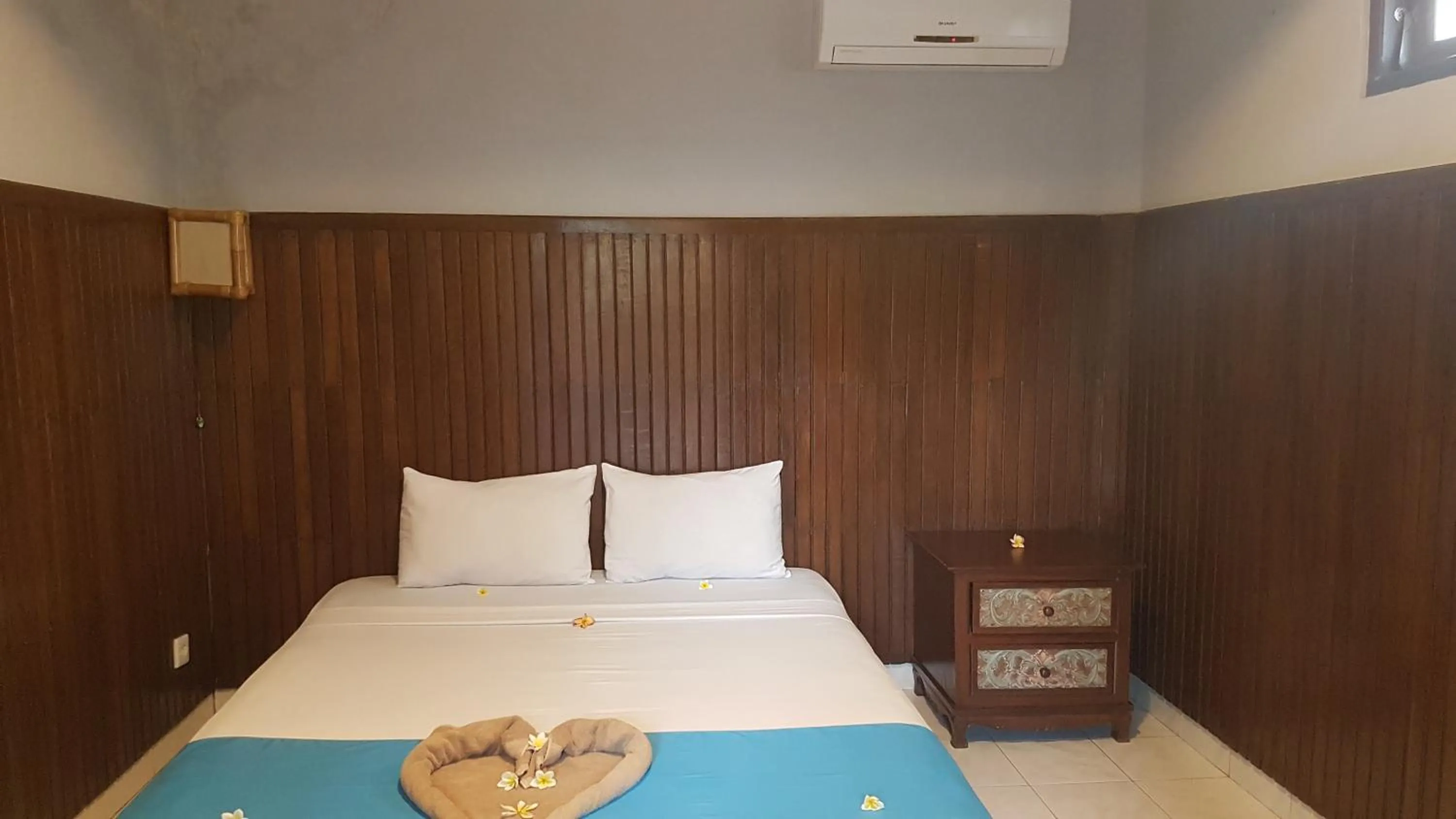 Bed in Puri Mandhara Lovina