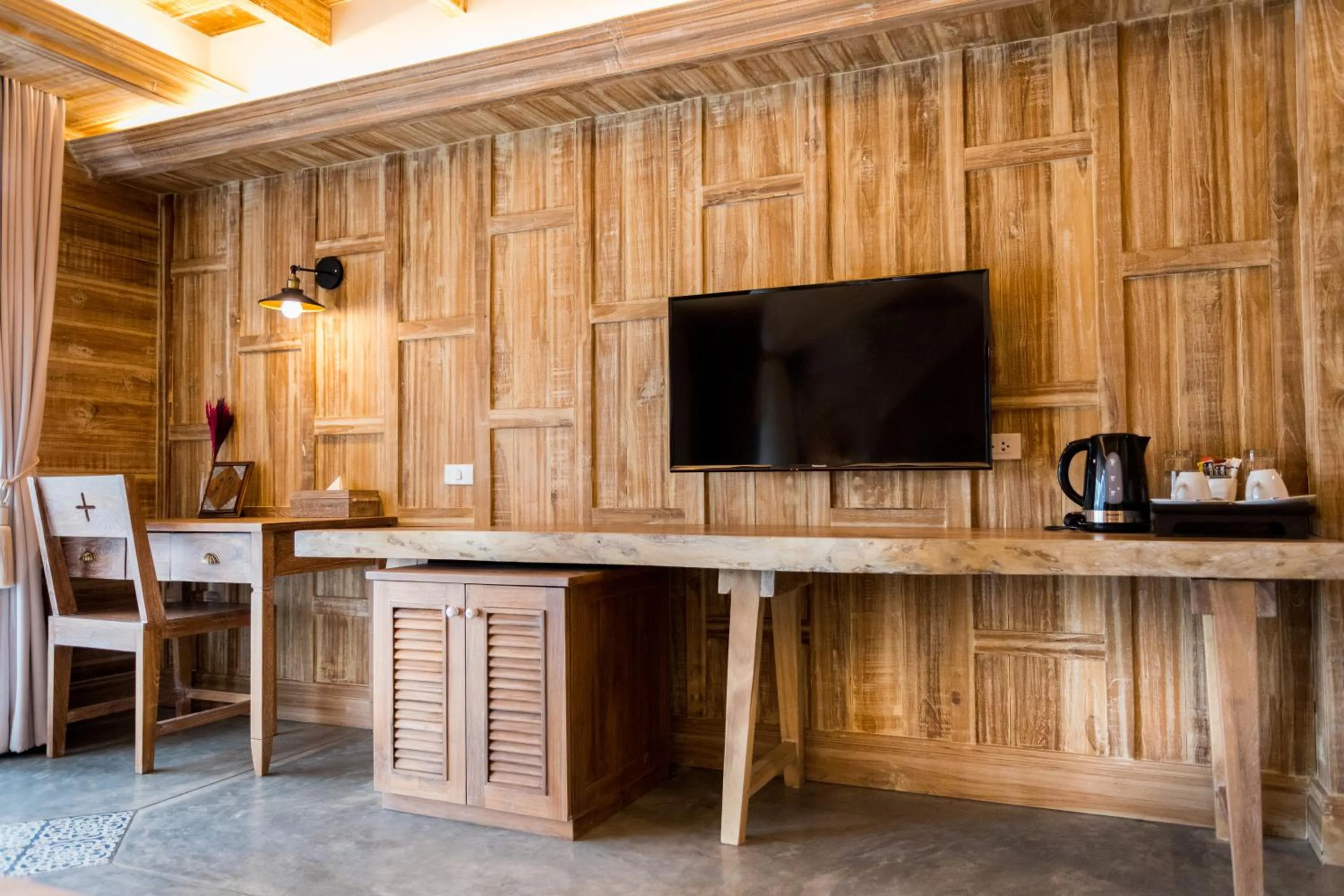 Photo of the whole room, TV/Entertainment Center in Nampiangdin Boutique Hotel