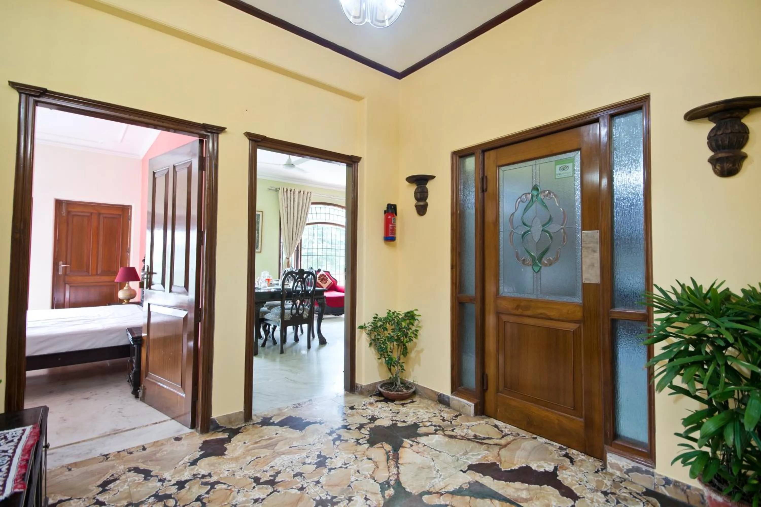 Communal lounge/ TV room, Bed in Prakash Kutir B&B