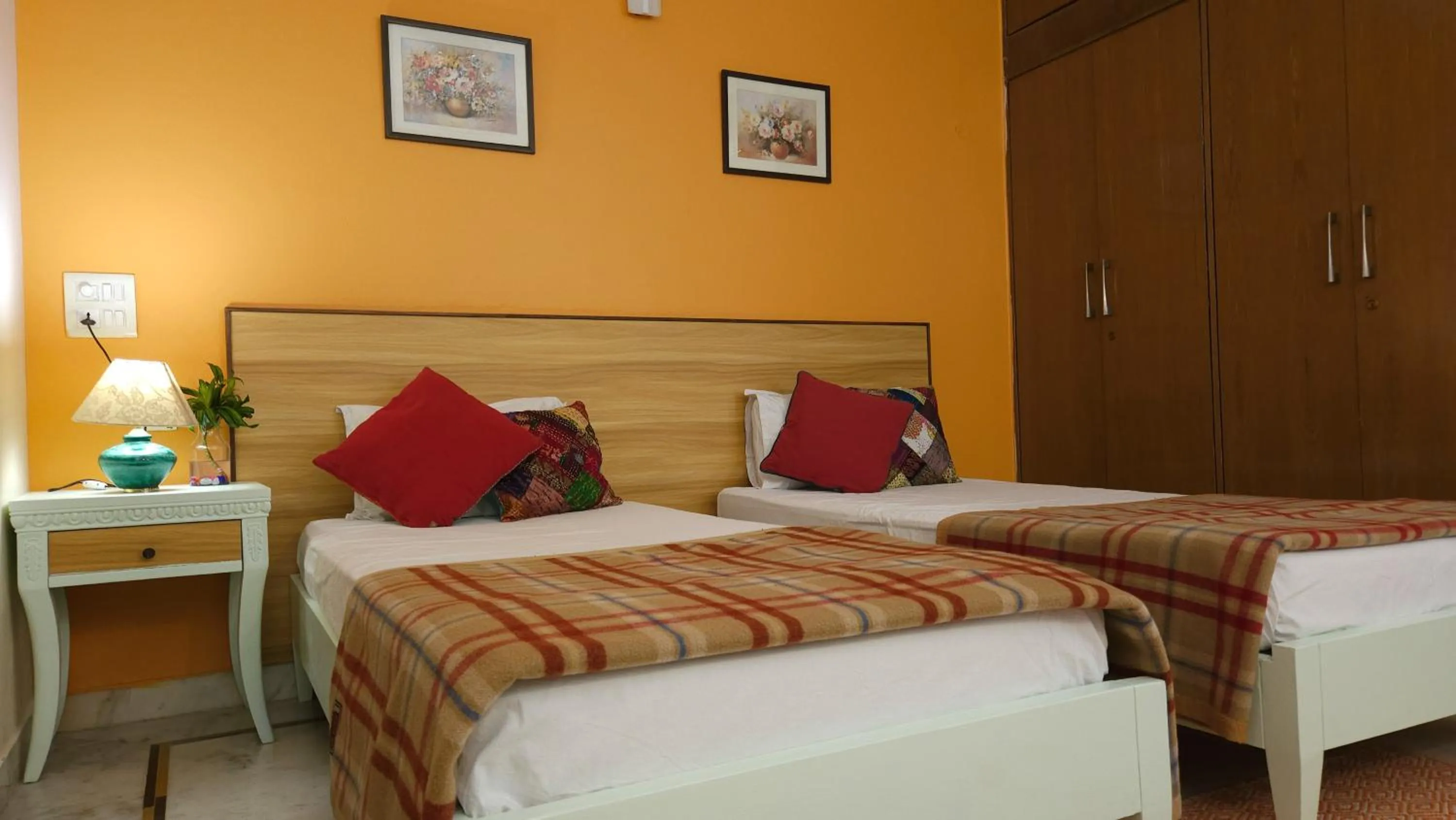 Bed in Prakash Kutir B&B