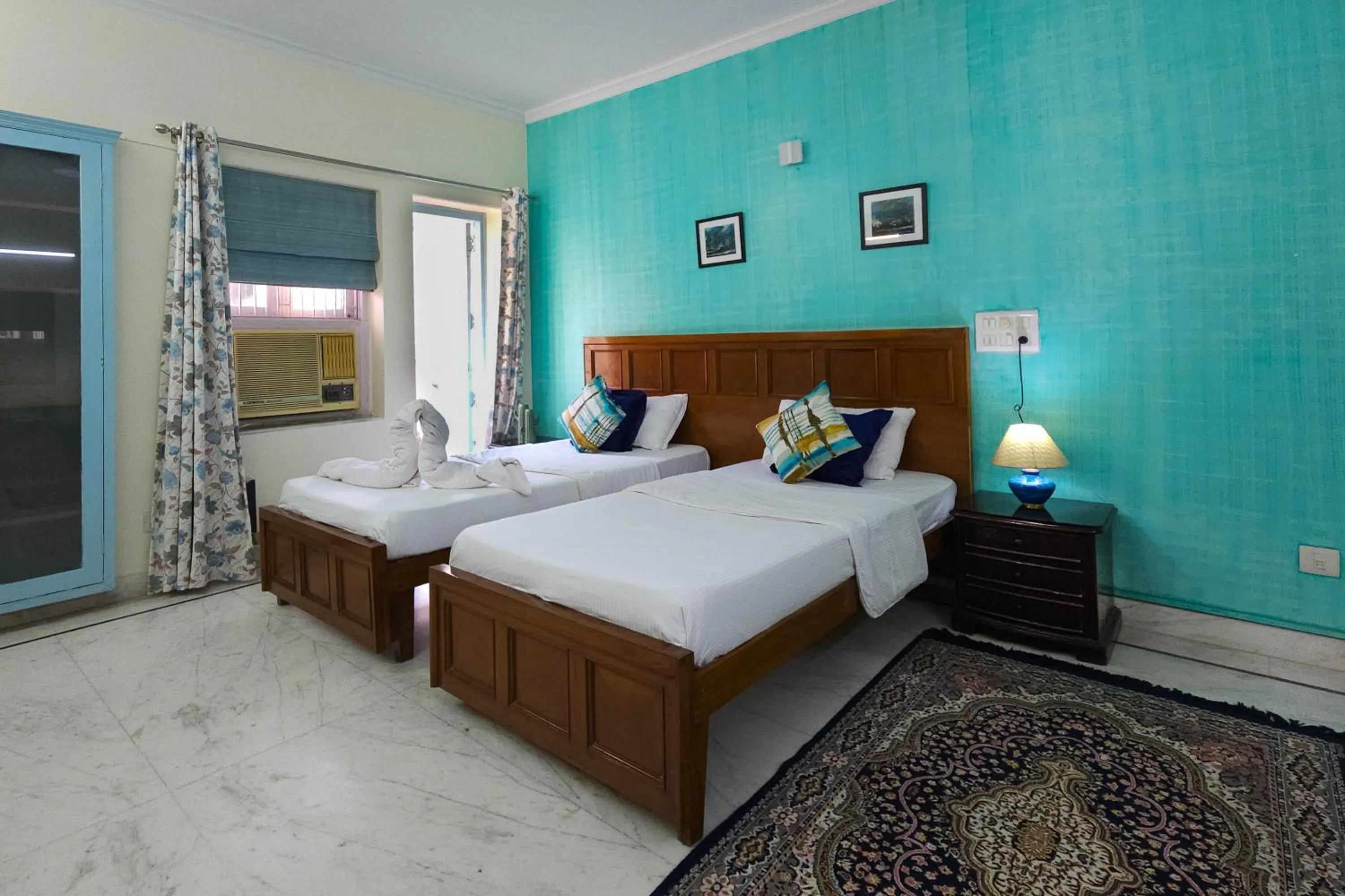 Bed in Prakash Kutir B&B