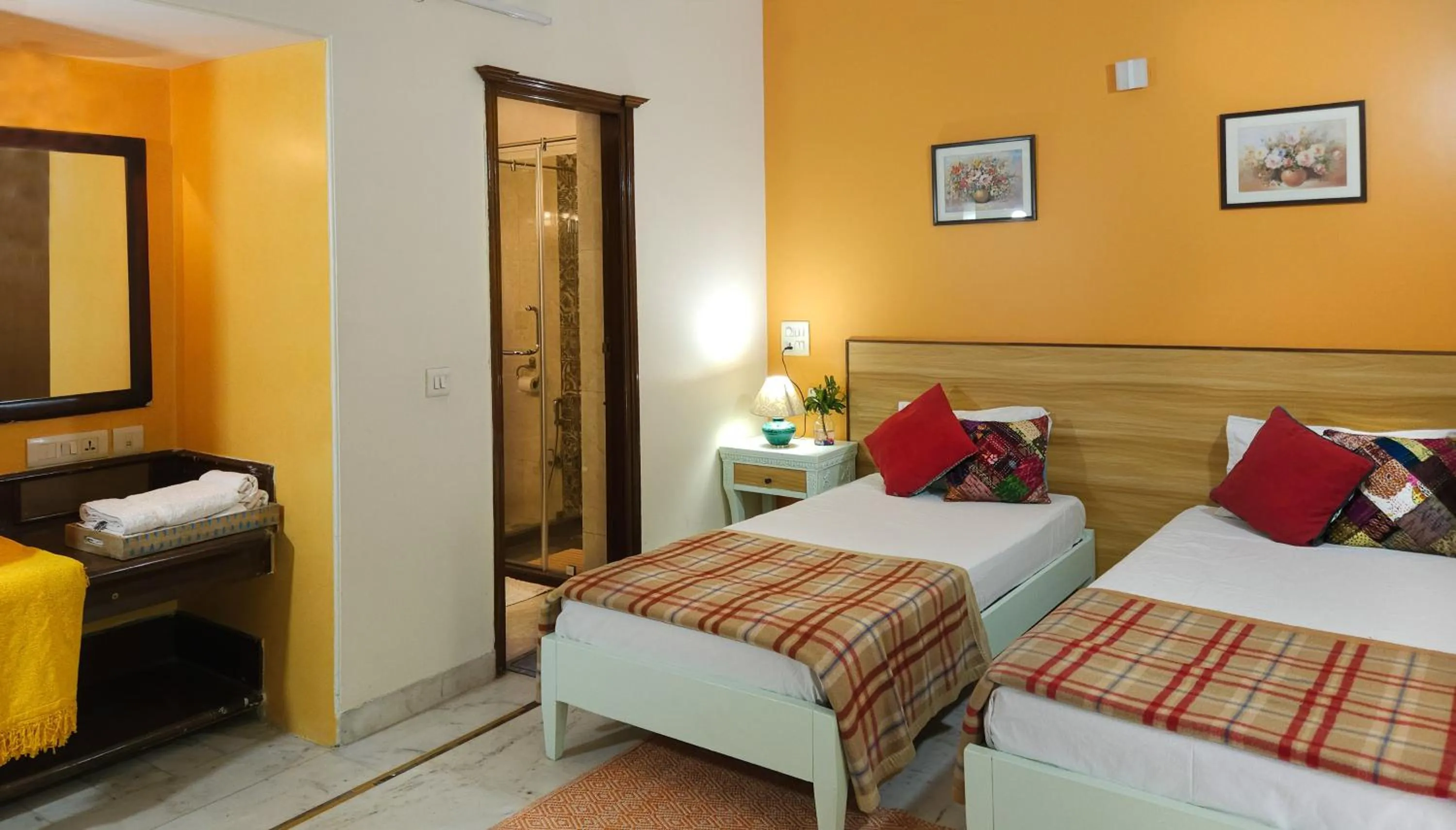 Bed in Prakash Kutir B&B