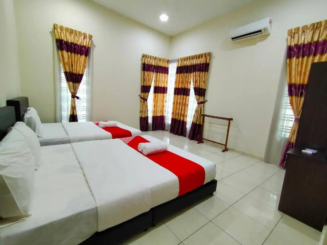 Bed in D' Anjung Inn