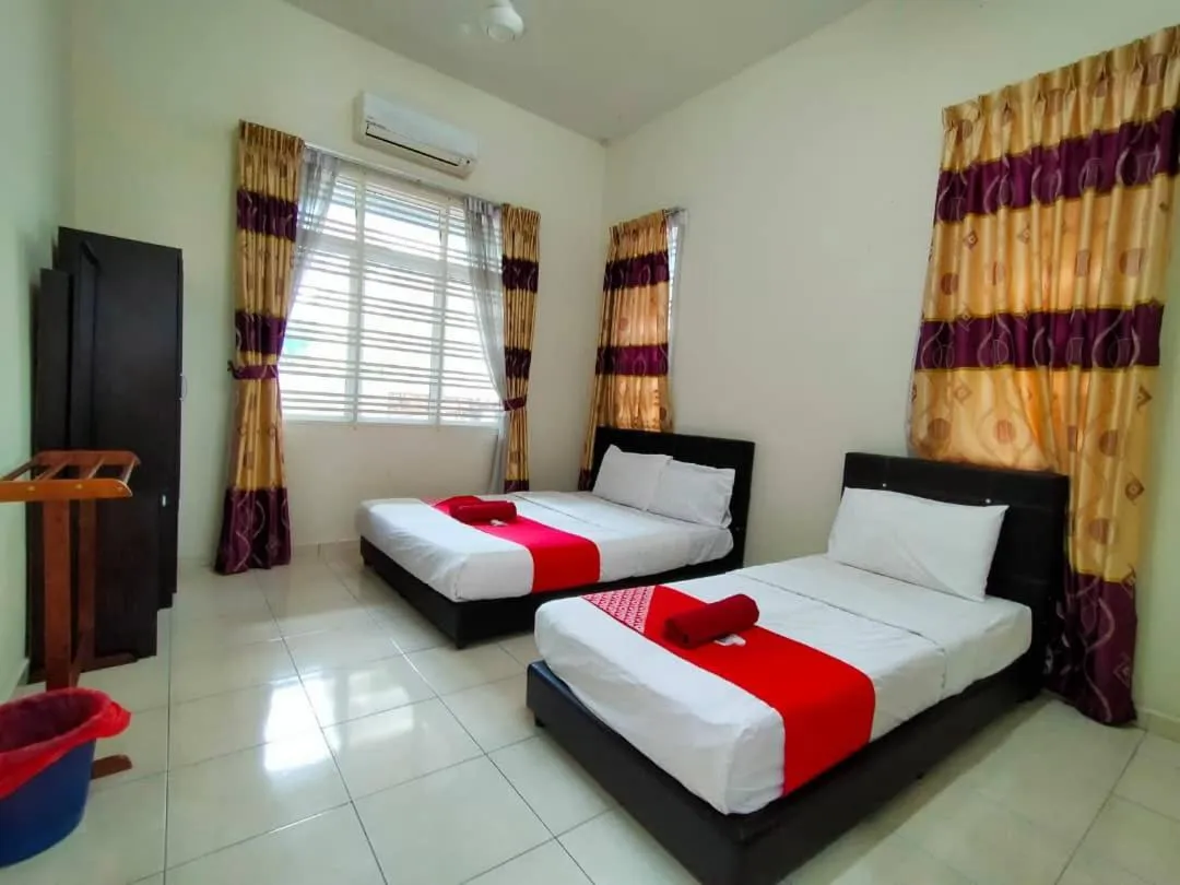 Bed in D' Anjung Inn