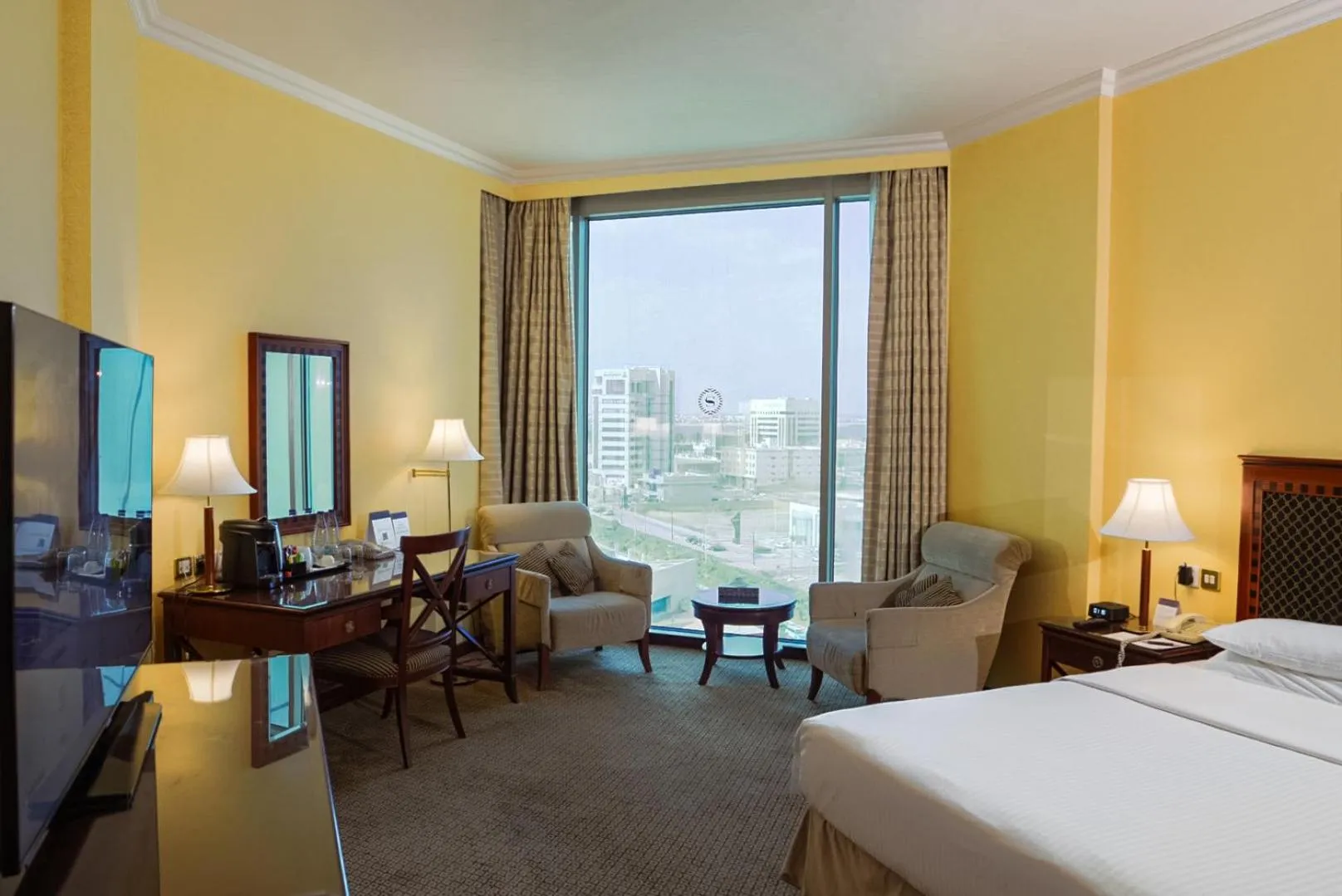 Photo of the whole room, Bed in Sheraton Dammam Hotel & Convention Centre