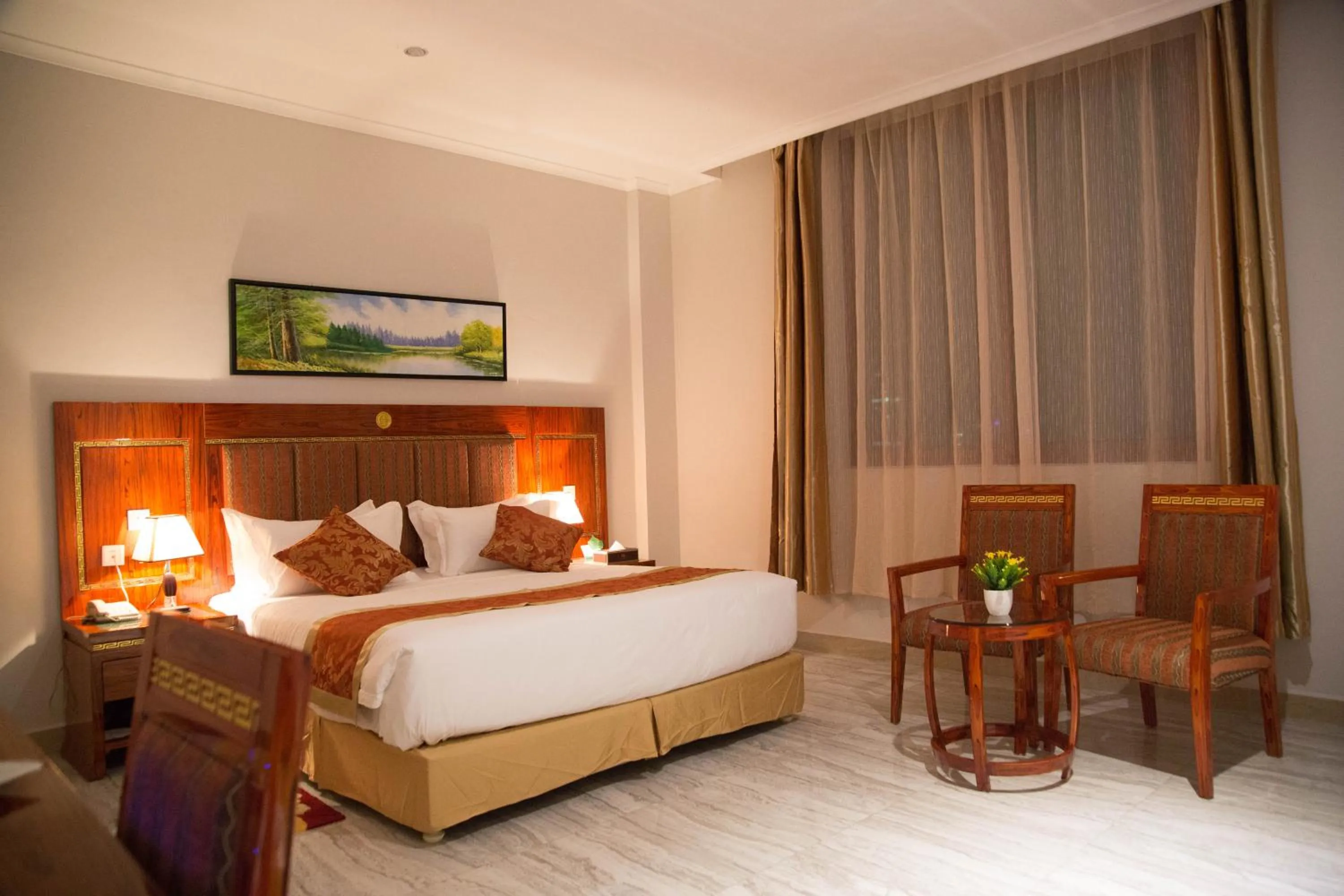 Photo of the whole room, Bed in Tiffany Diamond Hotels LTD - Makunganya