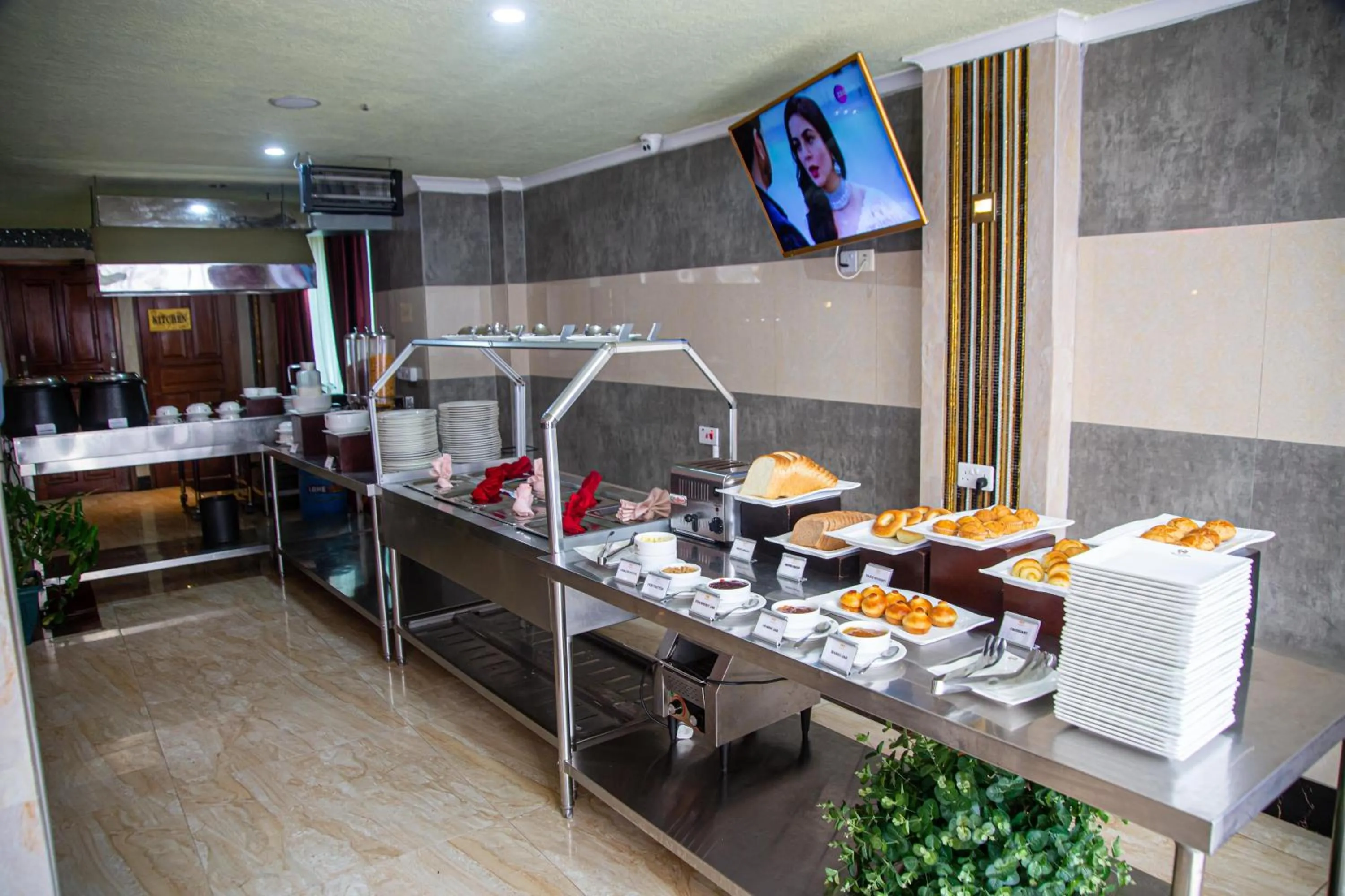 Buffet breakfast in Tiffany Diamond Hotels LTD - Makunganya