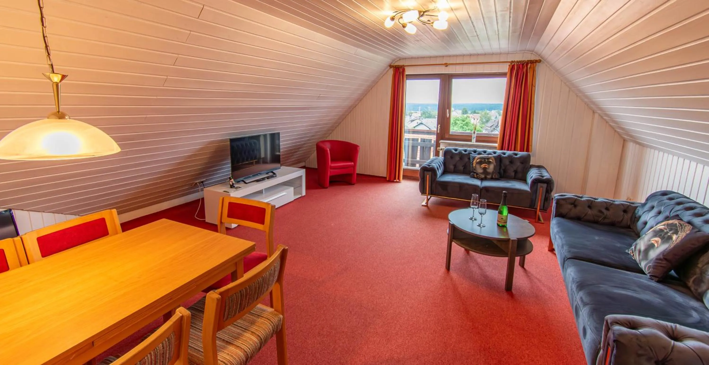 Communal lounge/ TV room in Wellnesshotel Hohenrodt