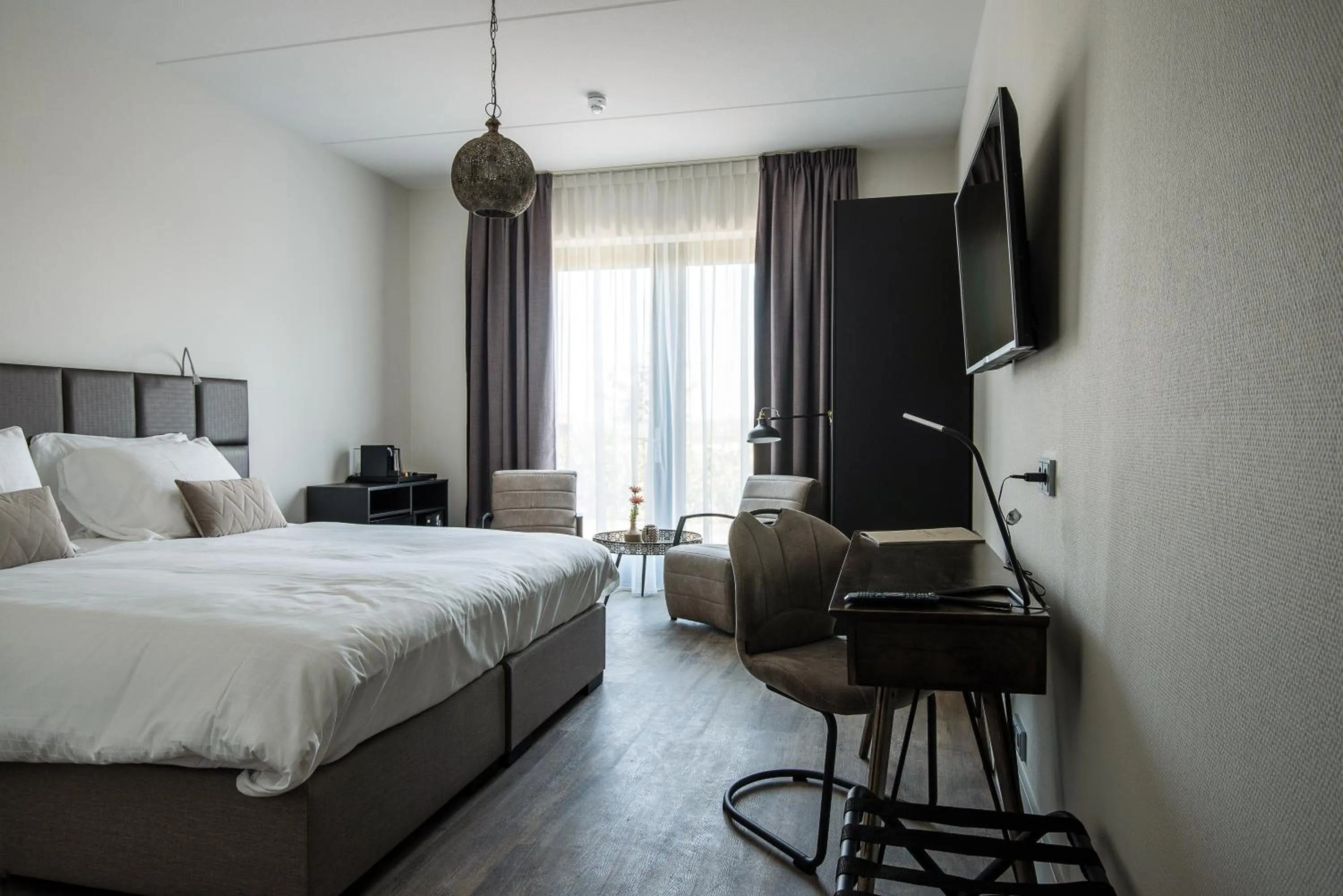 Communal lounge/ TV room, Bed in Fruitpark Hotel & Spa