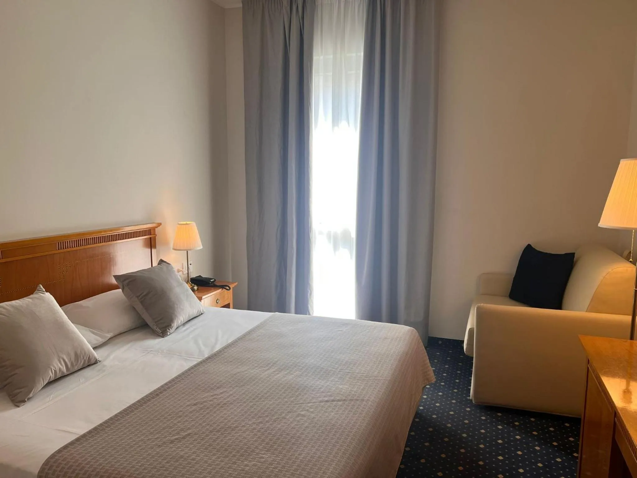 Photo of the whole room, Bed in Hotel Dorè