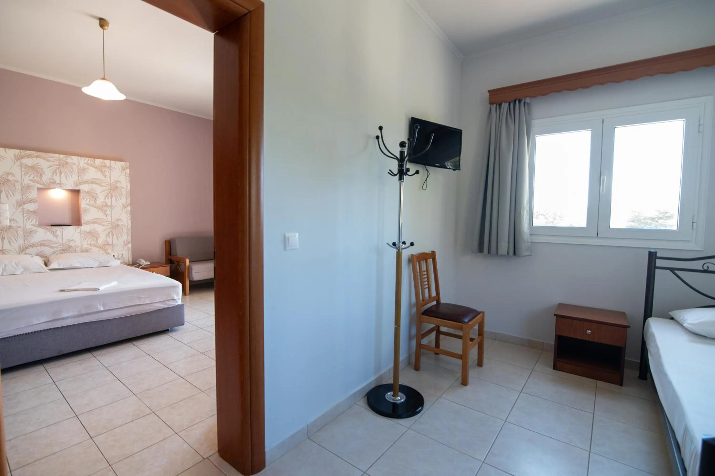 Bed in Elektra Hotel