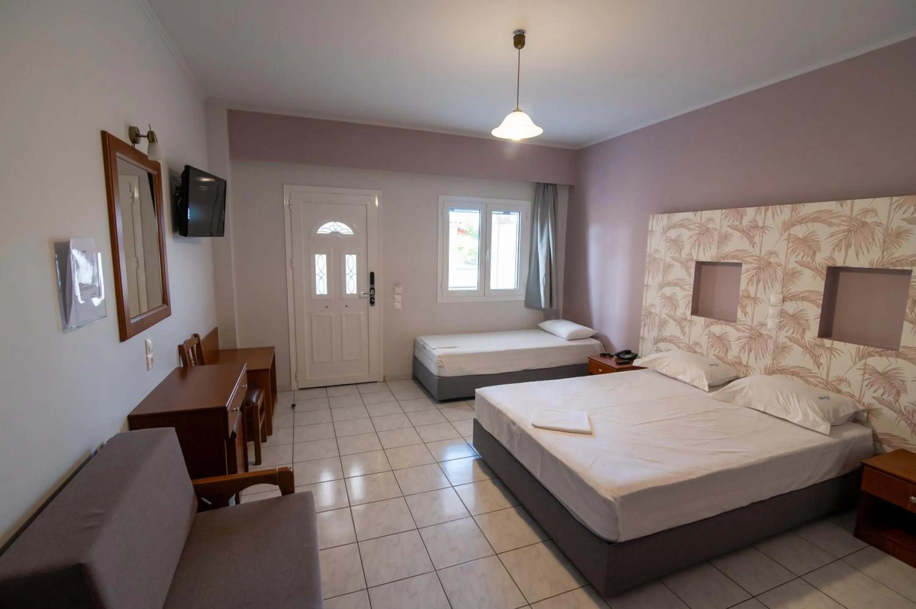 Bed in Elektra Hotel