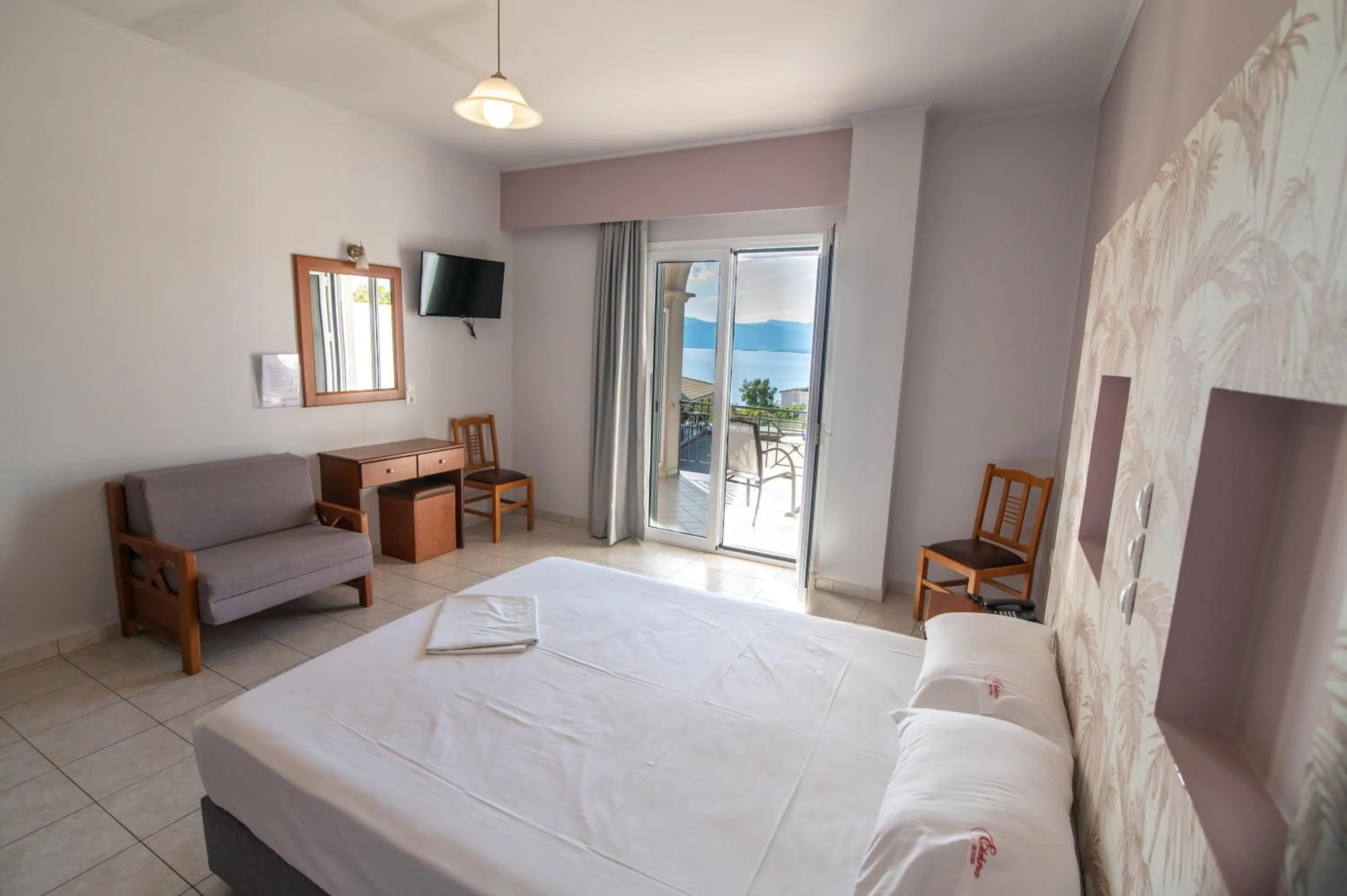 Bed in Elektra Hotel