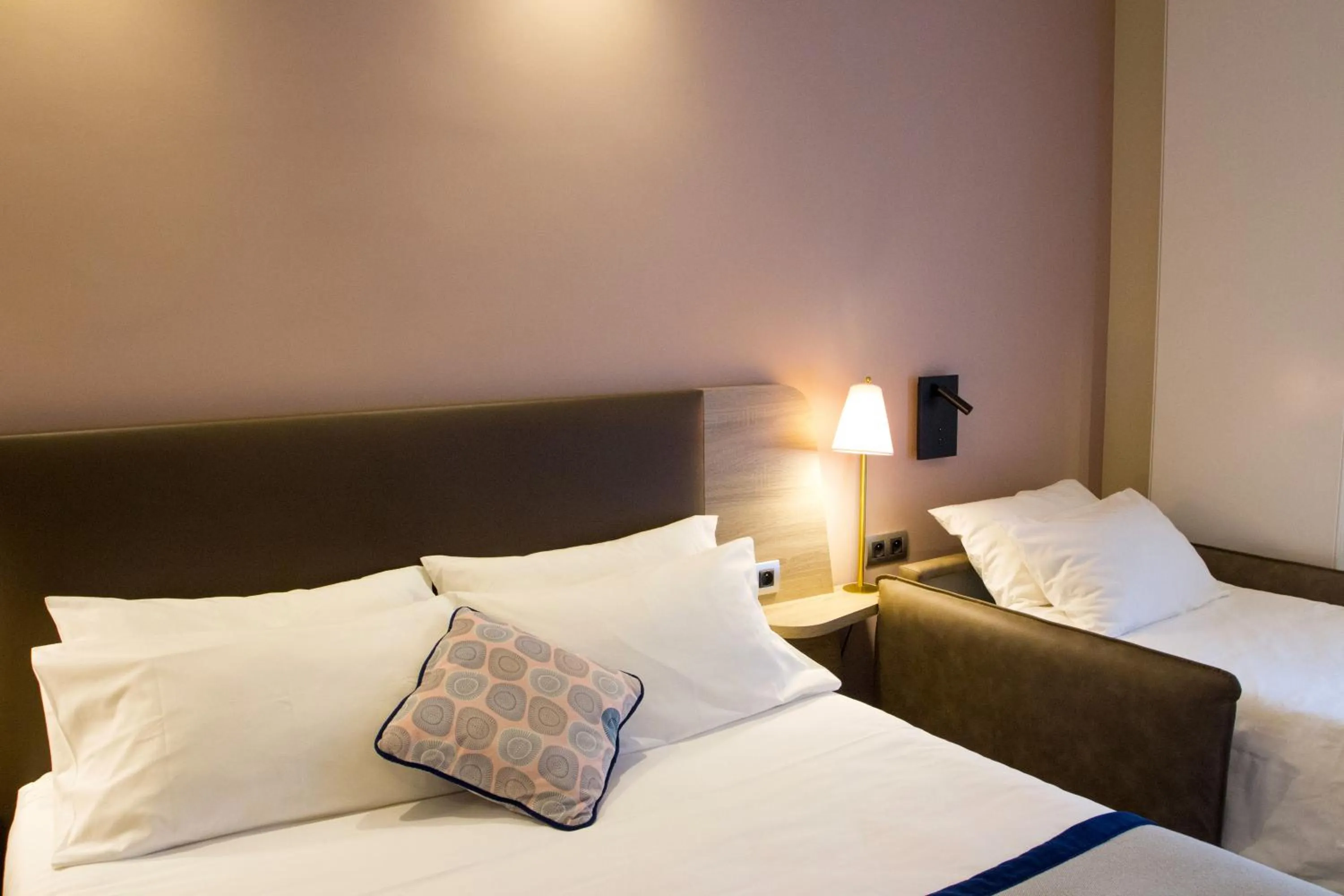 Bed in Hôtel de Sévigné