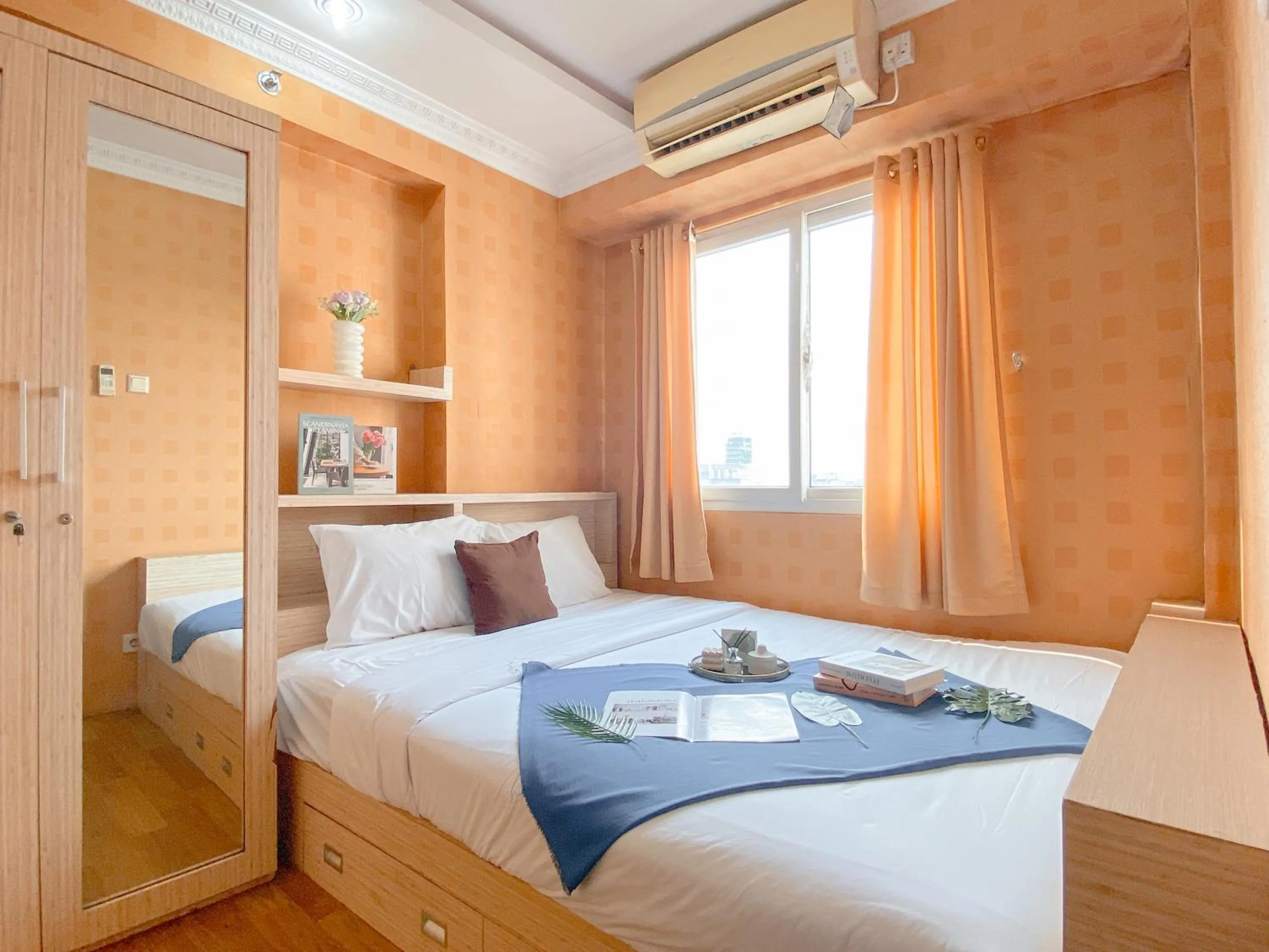 Two-Bedroom Apartment in Relaxing 2BR with Pool View Mutiara Bekasi Apartment By Travelio