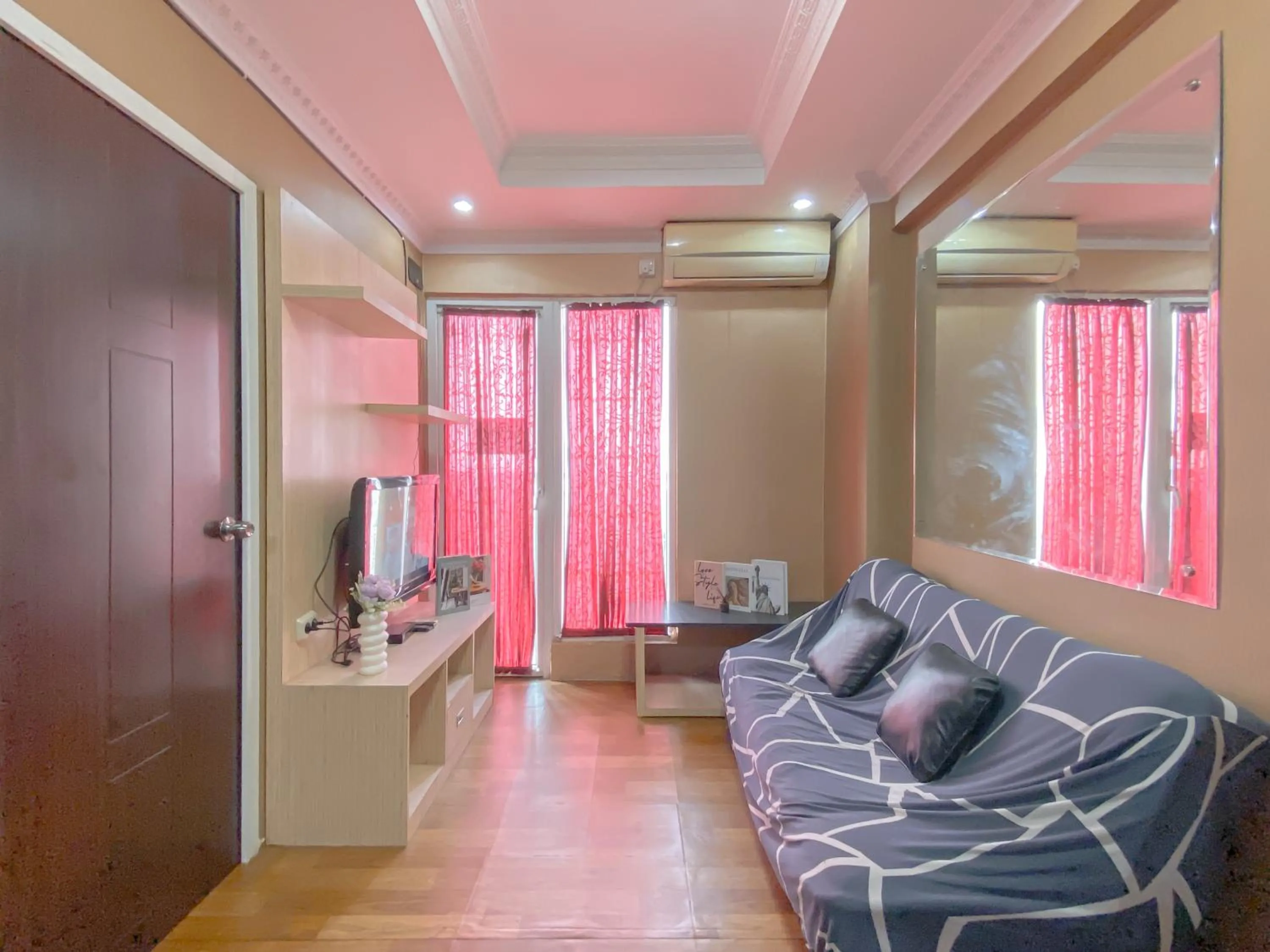 Two-Bedroom Apartment in Relaxing 2BR with Pool View Mutiara Bekasi Apartment By Travelio