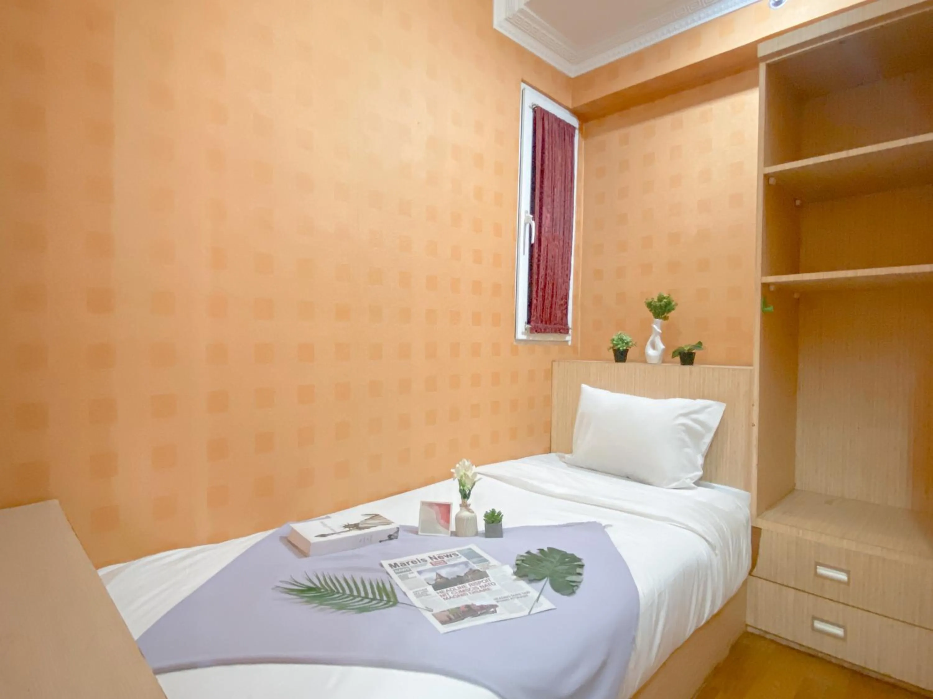 Two-Bedroom Apartment in Relaxing 2BR with Pool View Mutiara Bekasi Apartment By Travelio