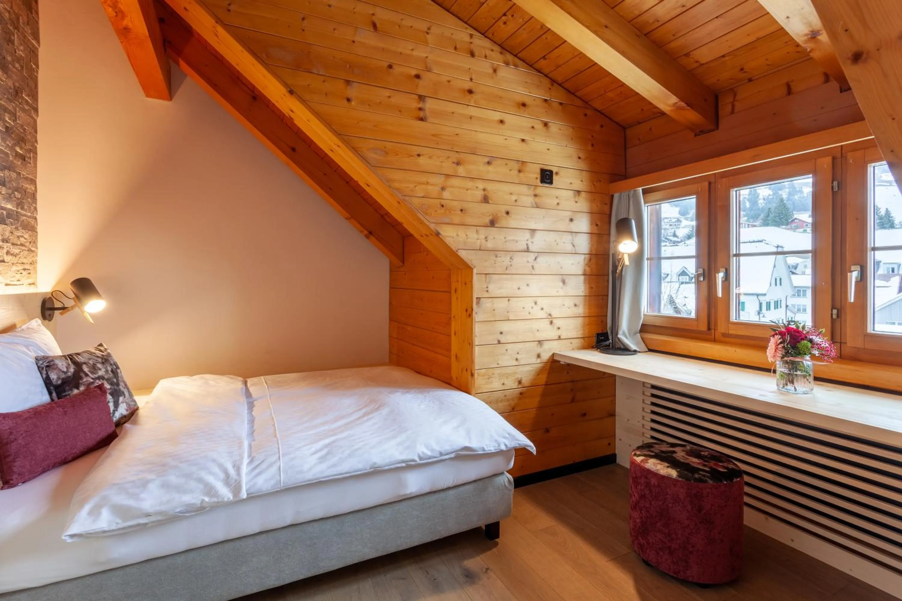 Photo of the whole room, Bed in Sonne Andermatt Swiss Quality Hotel