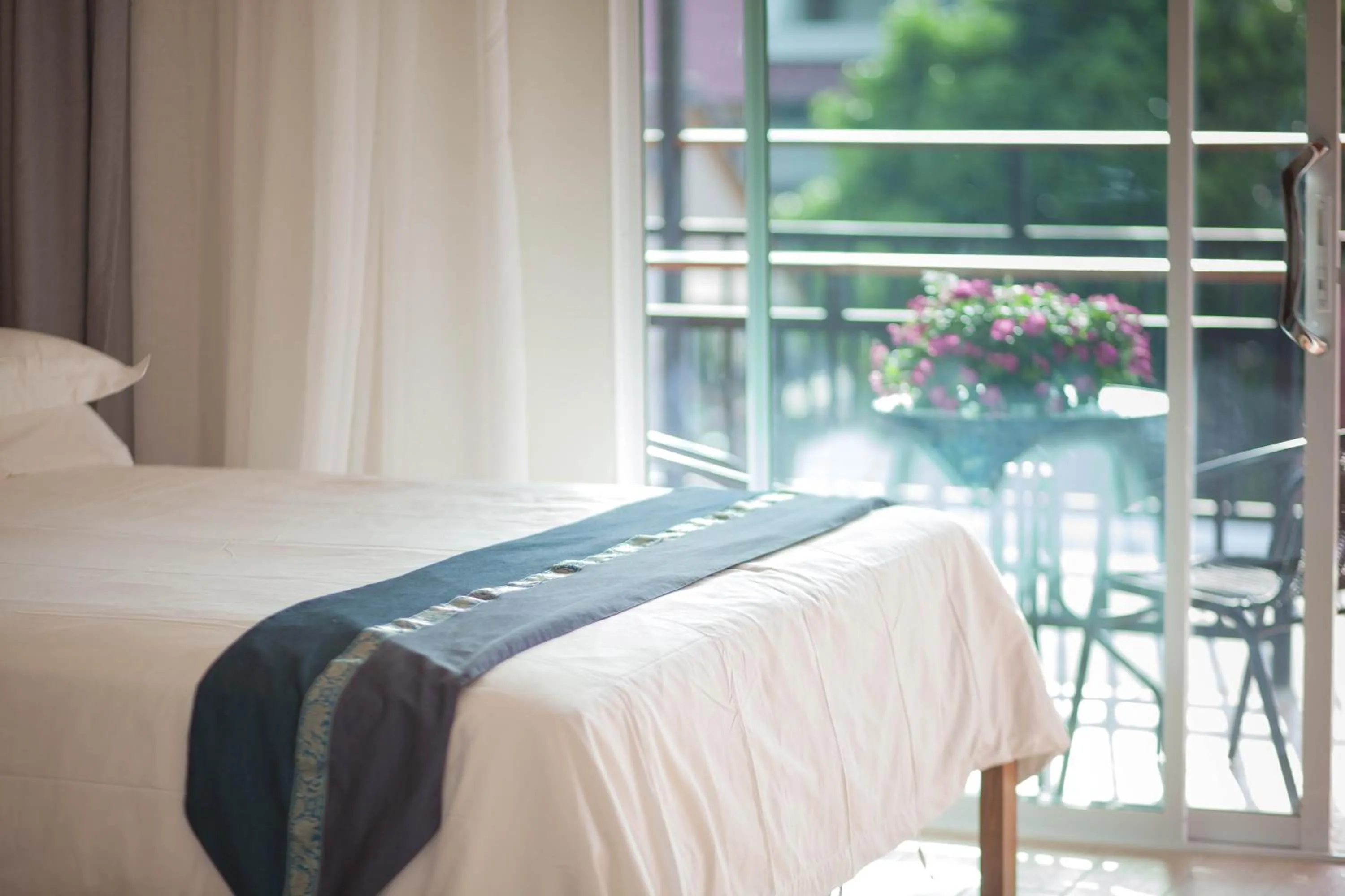 Bed in Celosia Chiang Mai Hotel