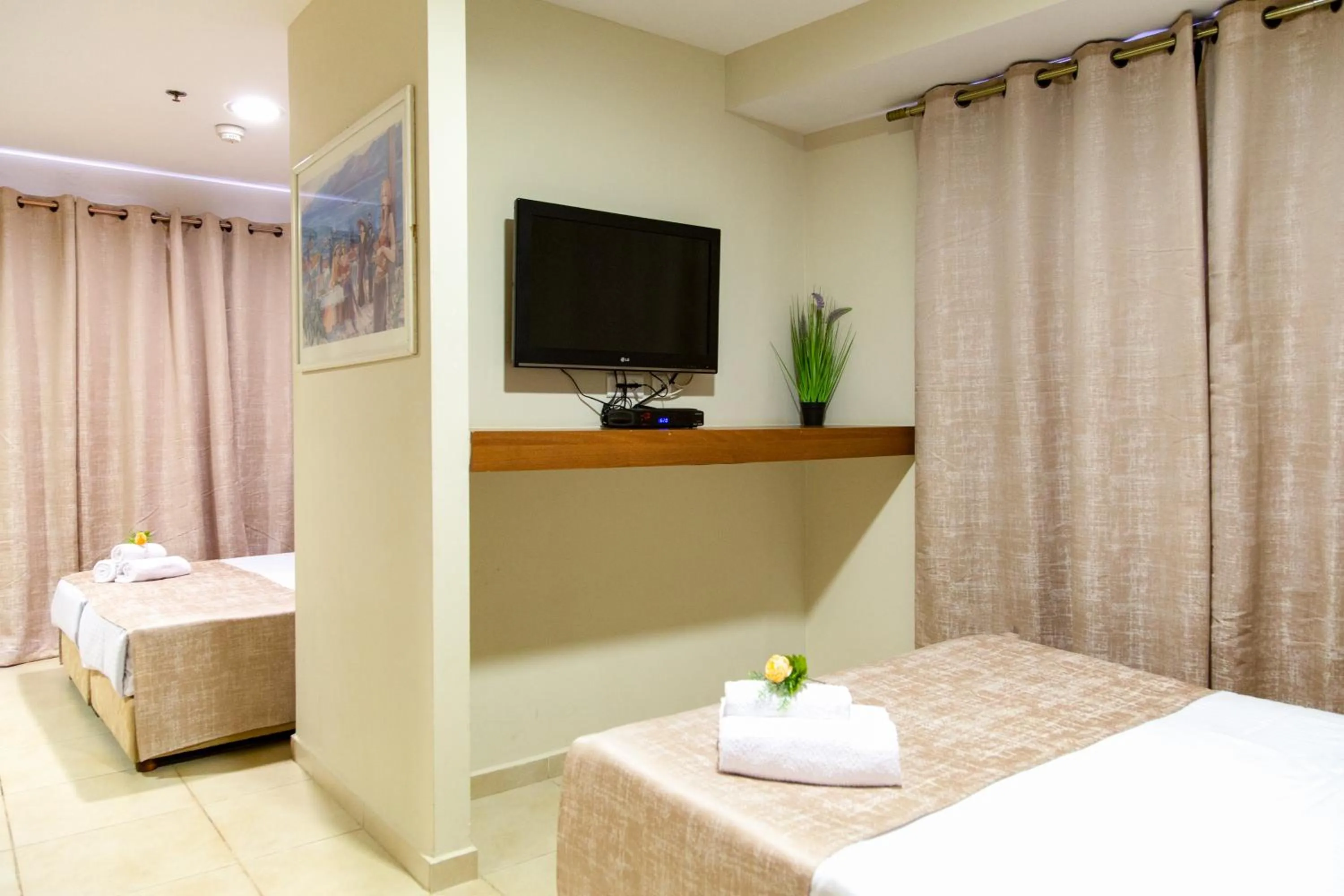 Bedroom, Bed in Motel Aviv