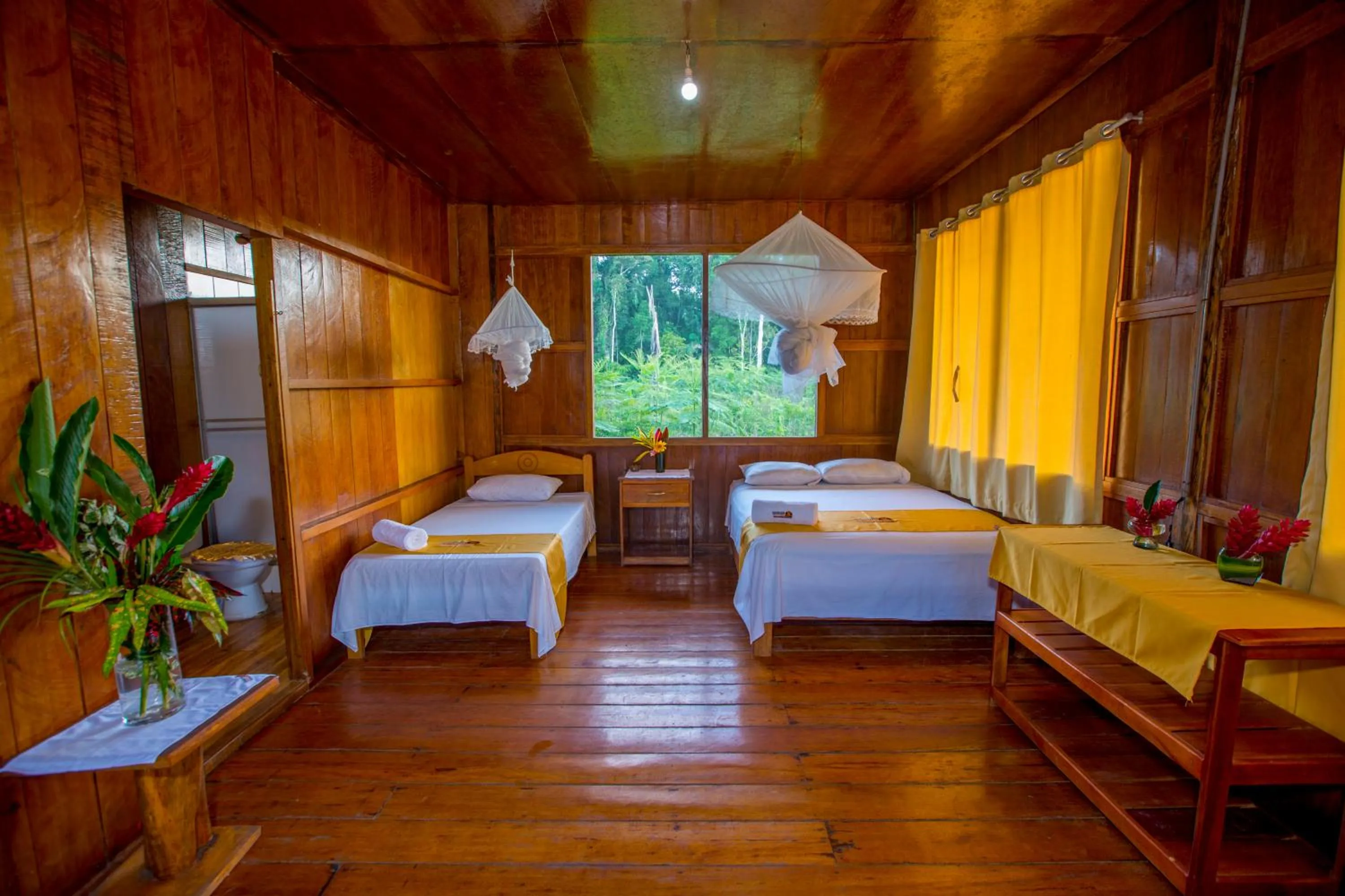 Property building, Bed in Monte Amazonico Lodge