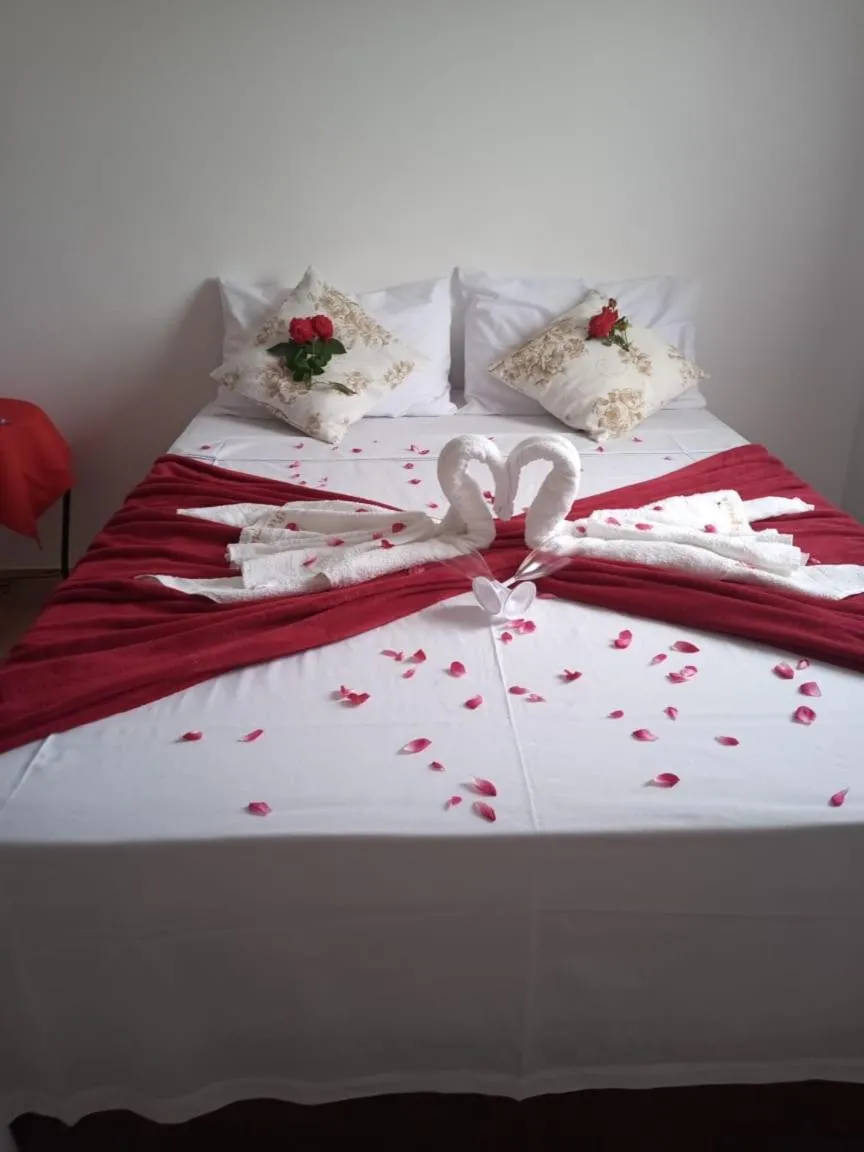 Bed in Pousada Parapuã