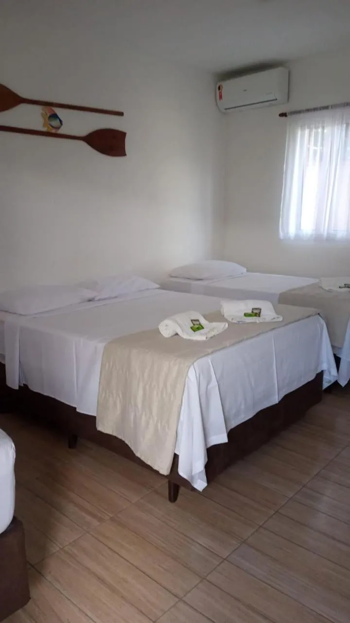 Bed in Pousada Parapuã
