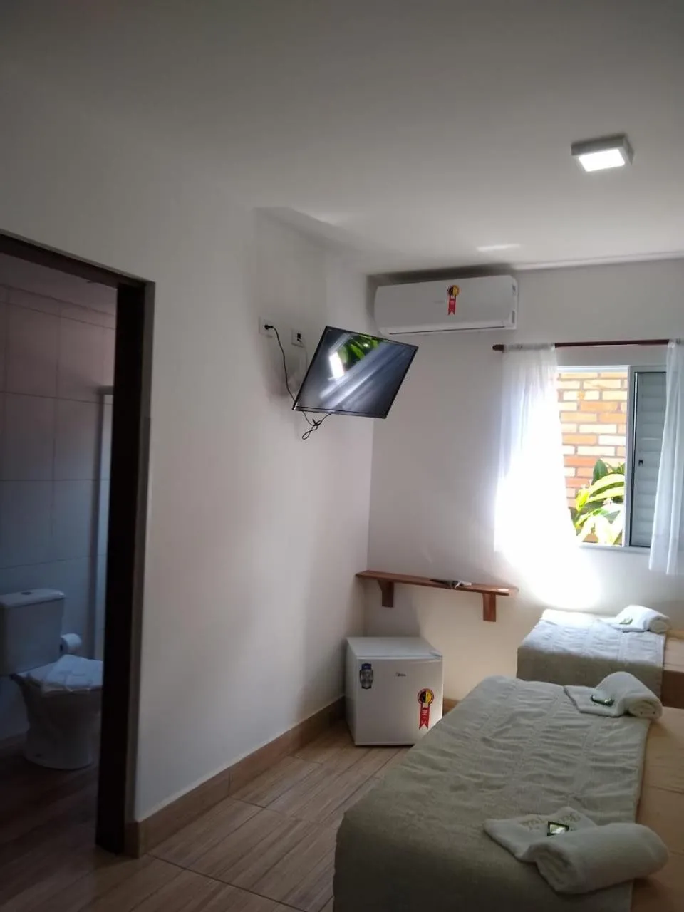 Bed in Pousada Parapuã