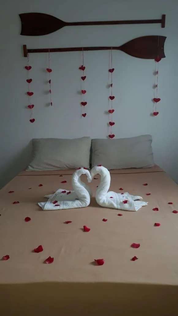Bed in Pousada Parapuã