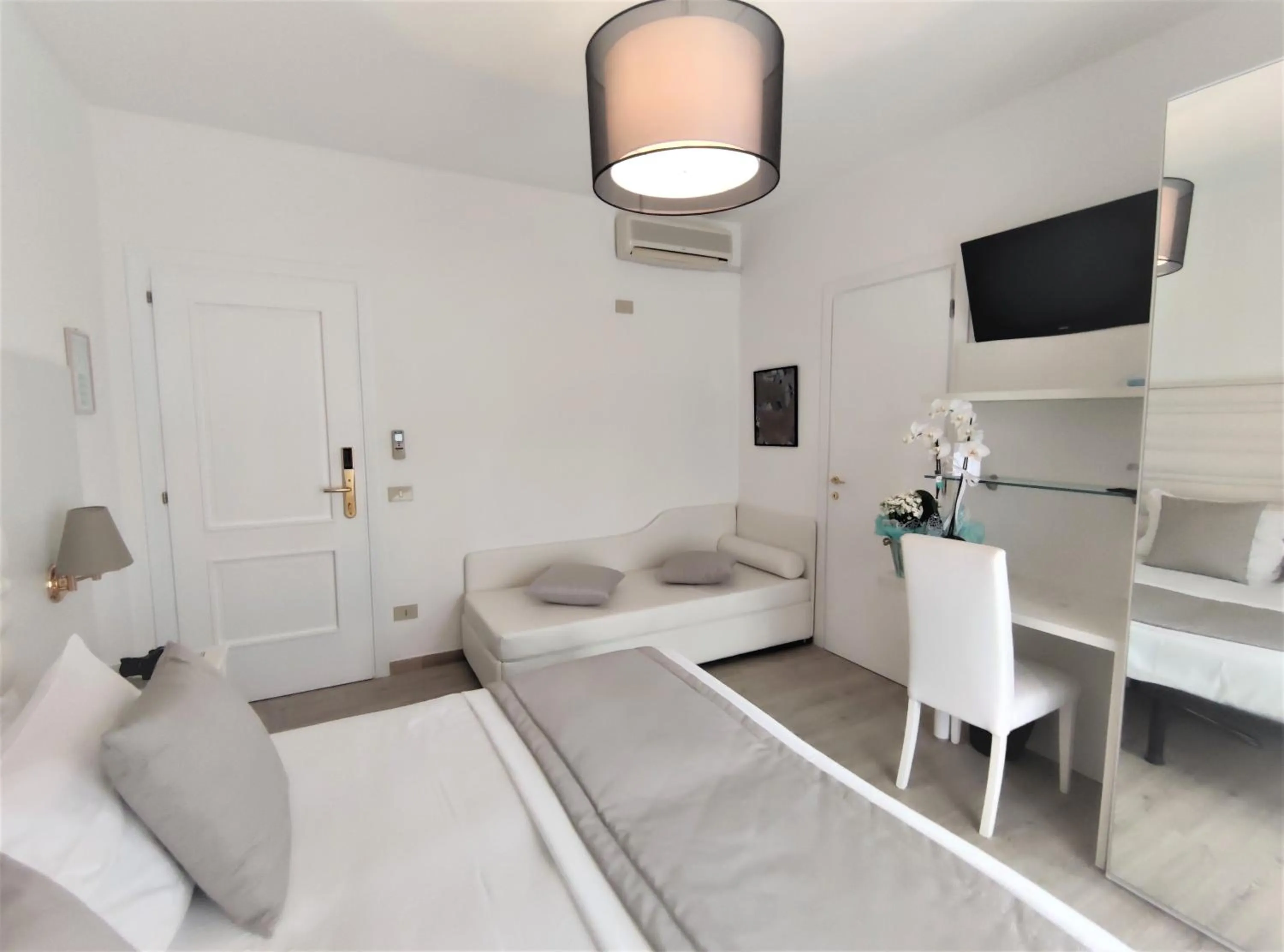 Bed in Hotel Rossini 4S