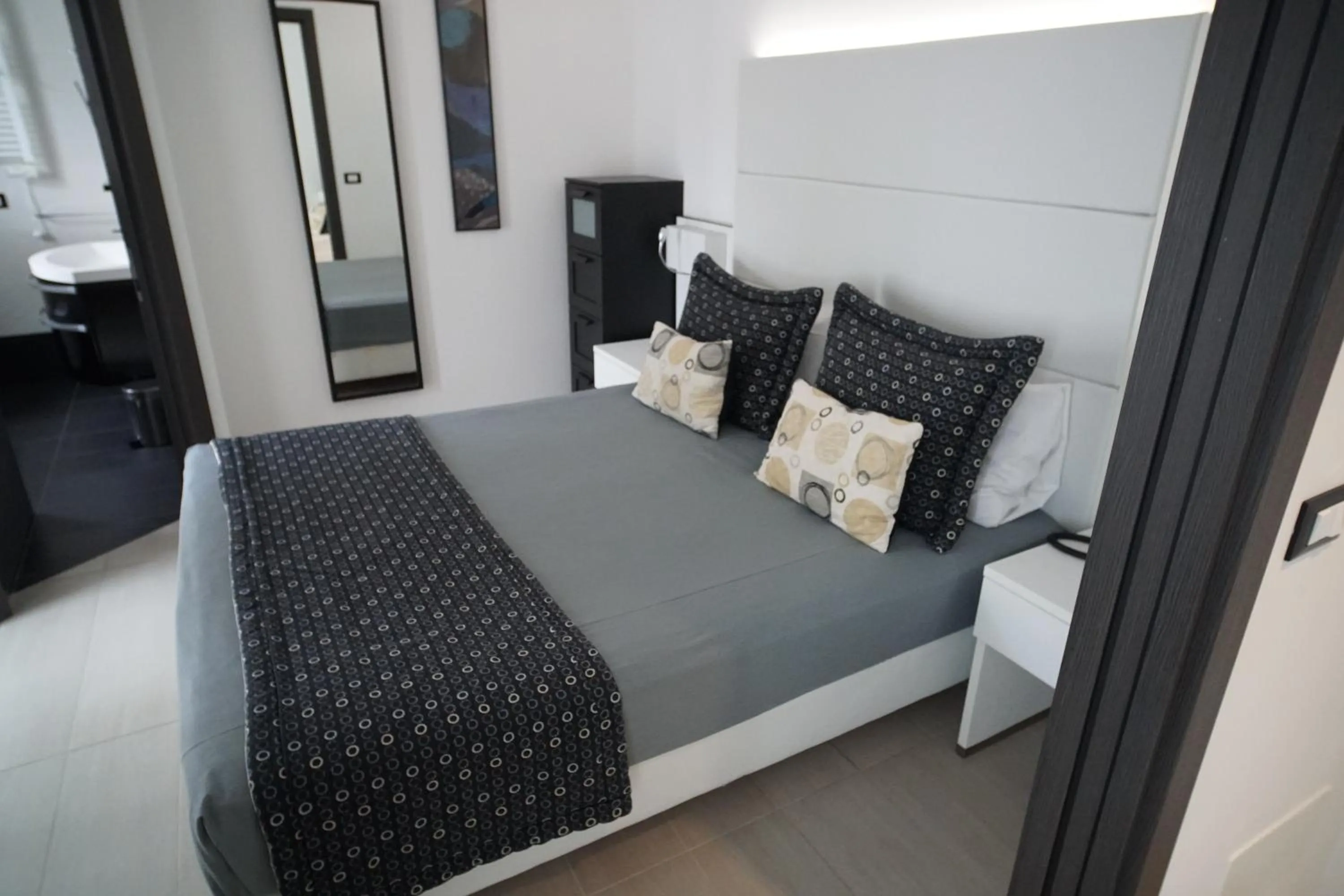 Bed in Hotel Rossini 4S