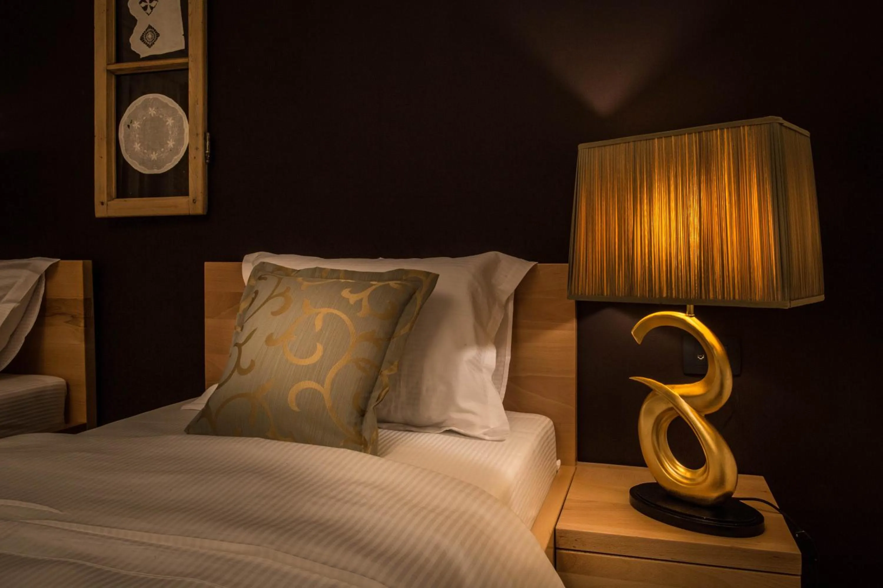 Decorative detail, Bed in GARNI HOTEL ATRIUM