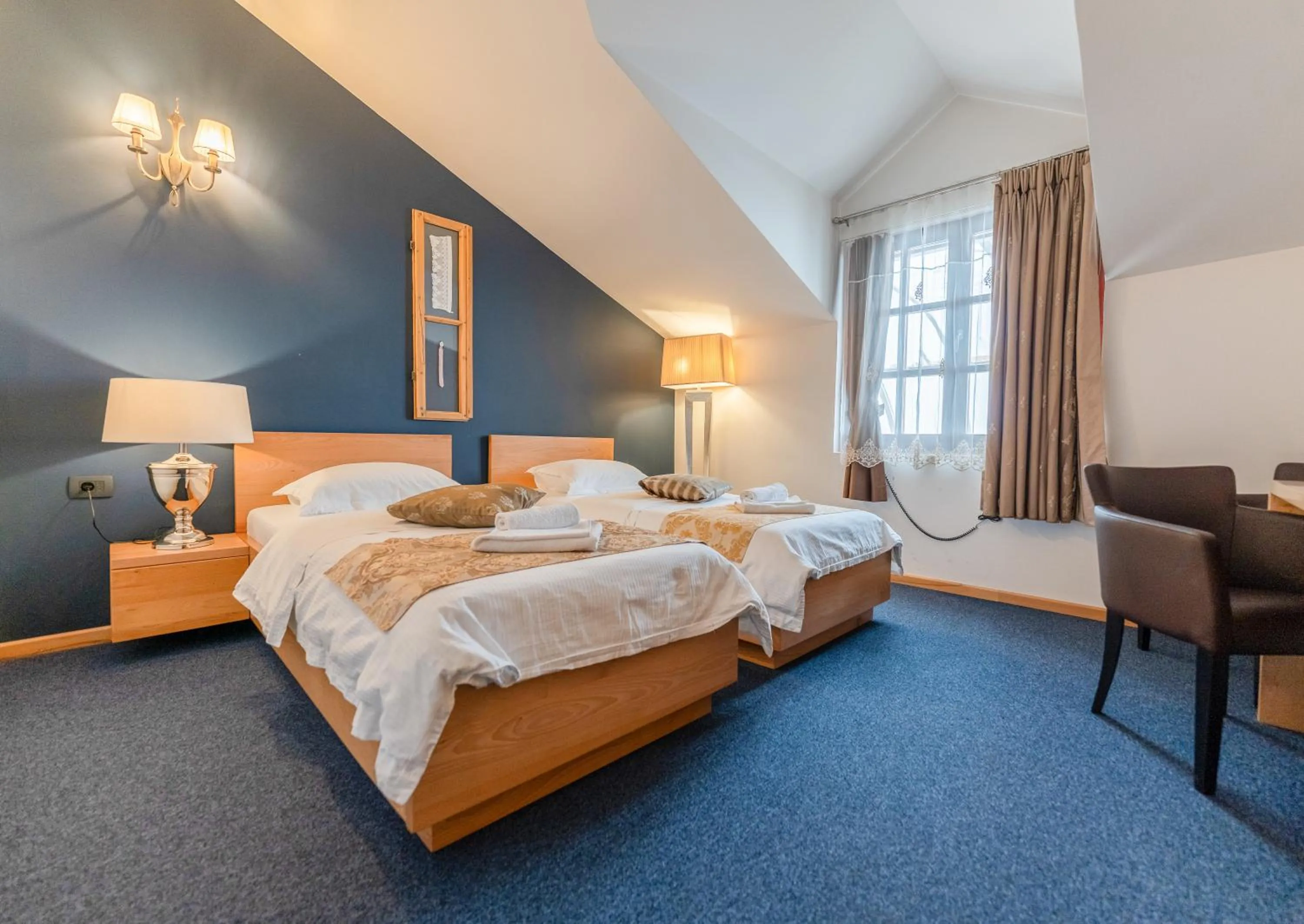 Bedroom, Bed in GARNI HOTEL ATRIUM